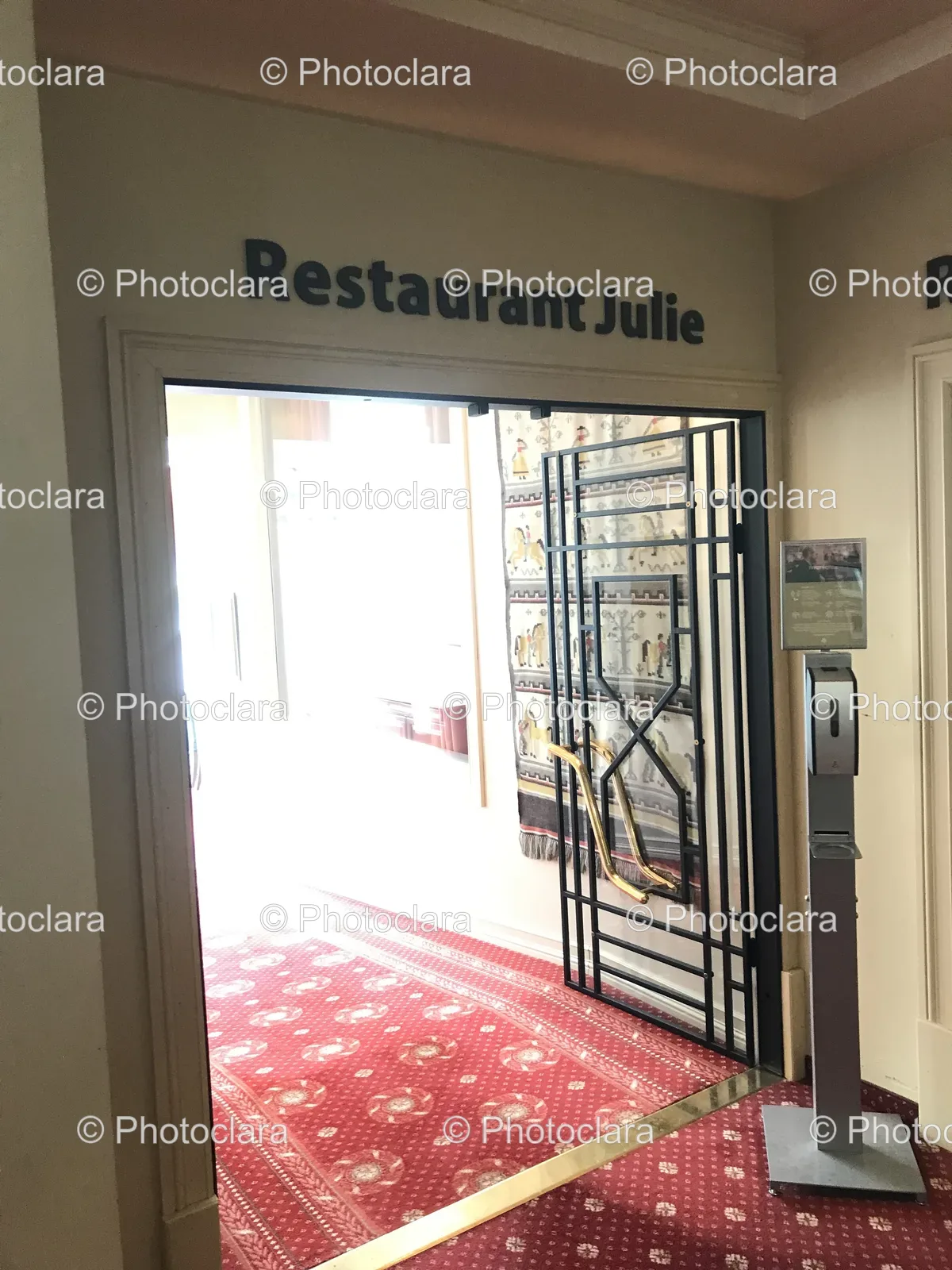 metal-gate-entrance-restaurant-julie.jpg