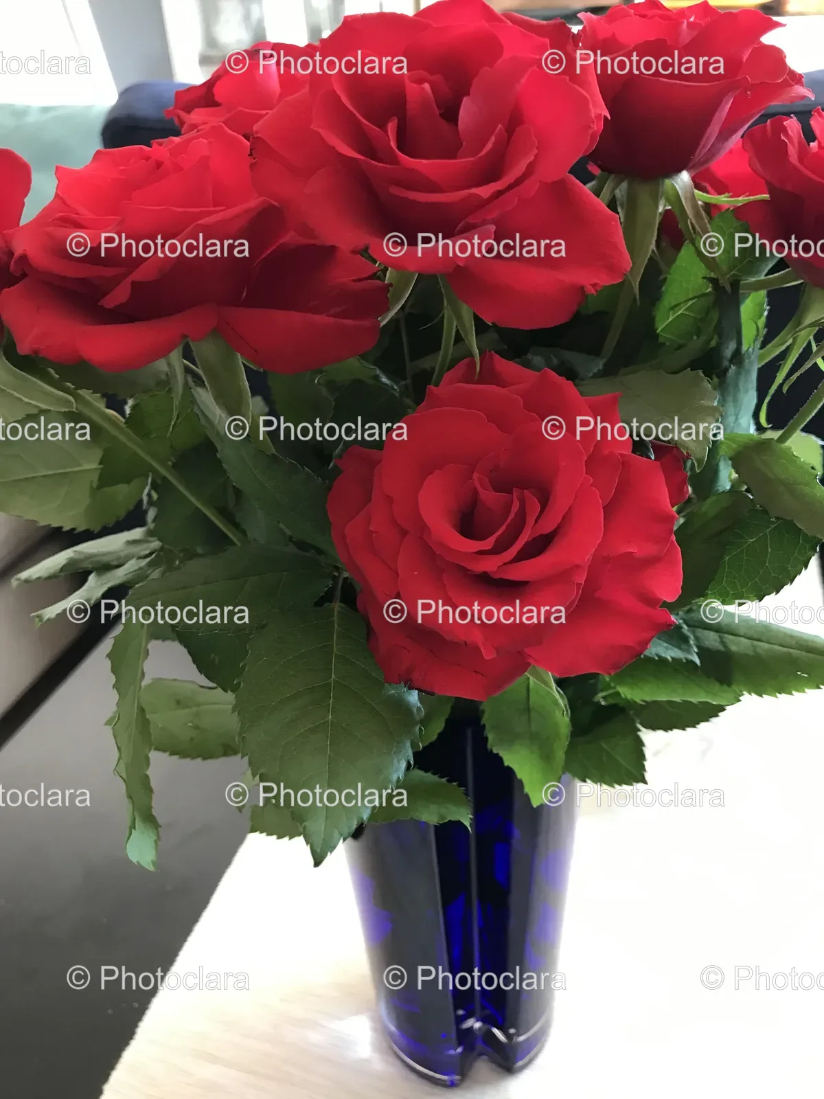 bouquet-of-red-roses-in-blue-vase.jpg