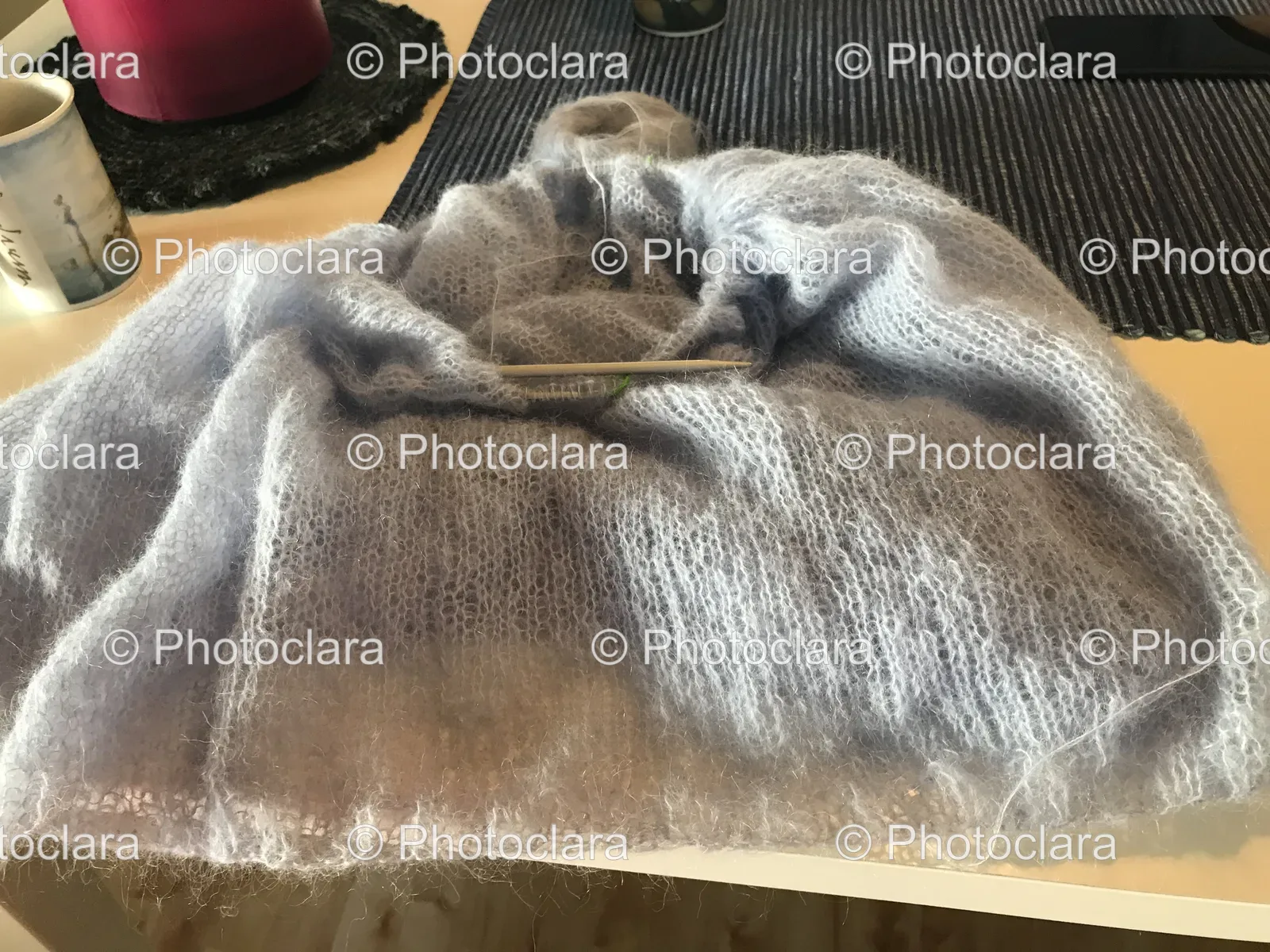 Knitted-Sweater-on-Table-with-Grey-Cat.jpg