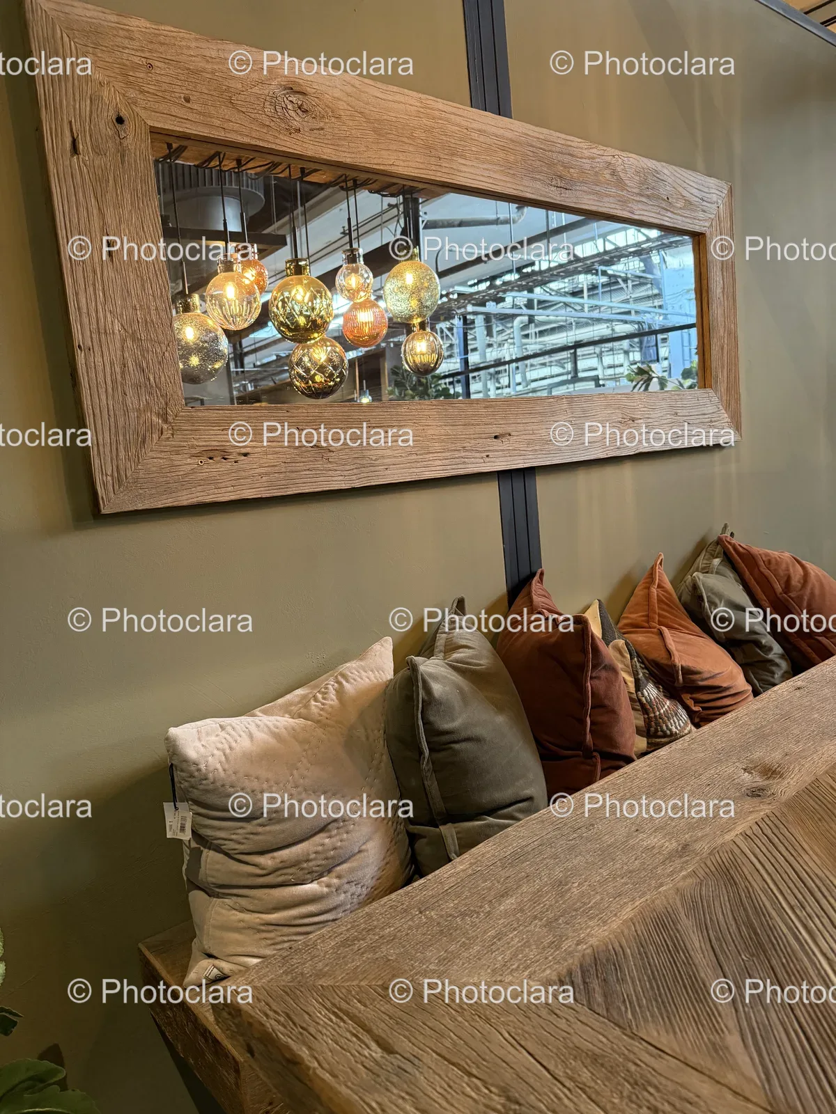 Mirror-Above-a-Decorative-Bench-with-Pillows.jpg