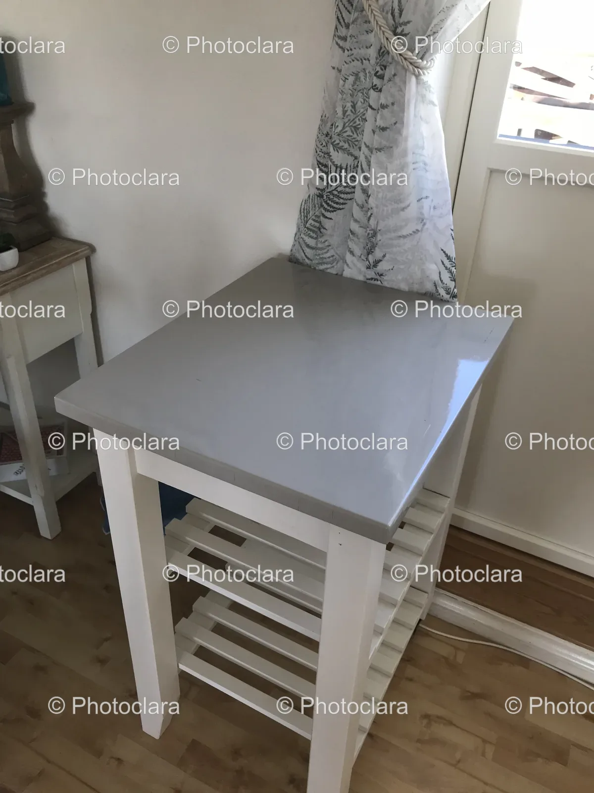 White-Table-With-Shelf-And-Curtain.jpg