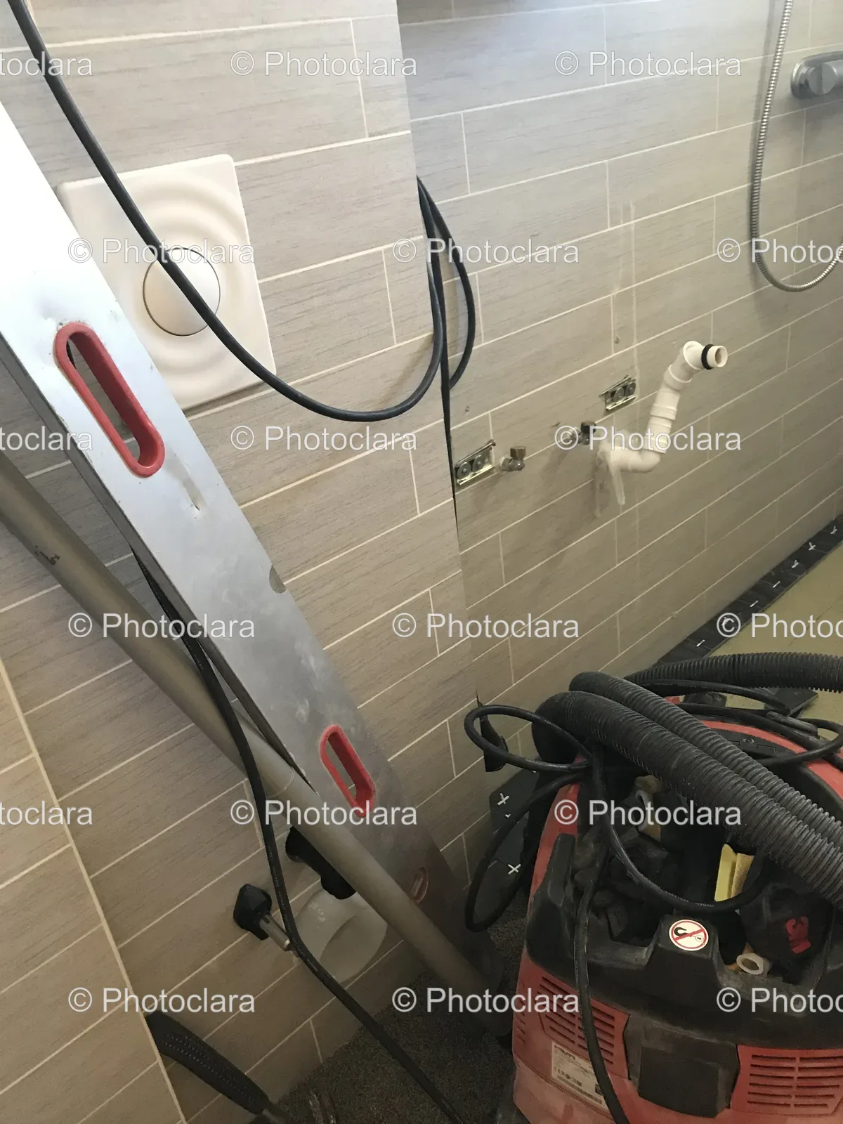 ladder-and-hoses-on-wall.jpg