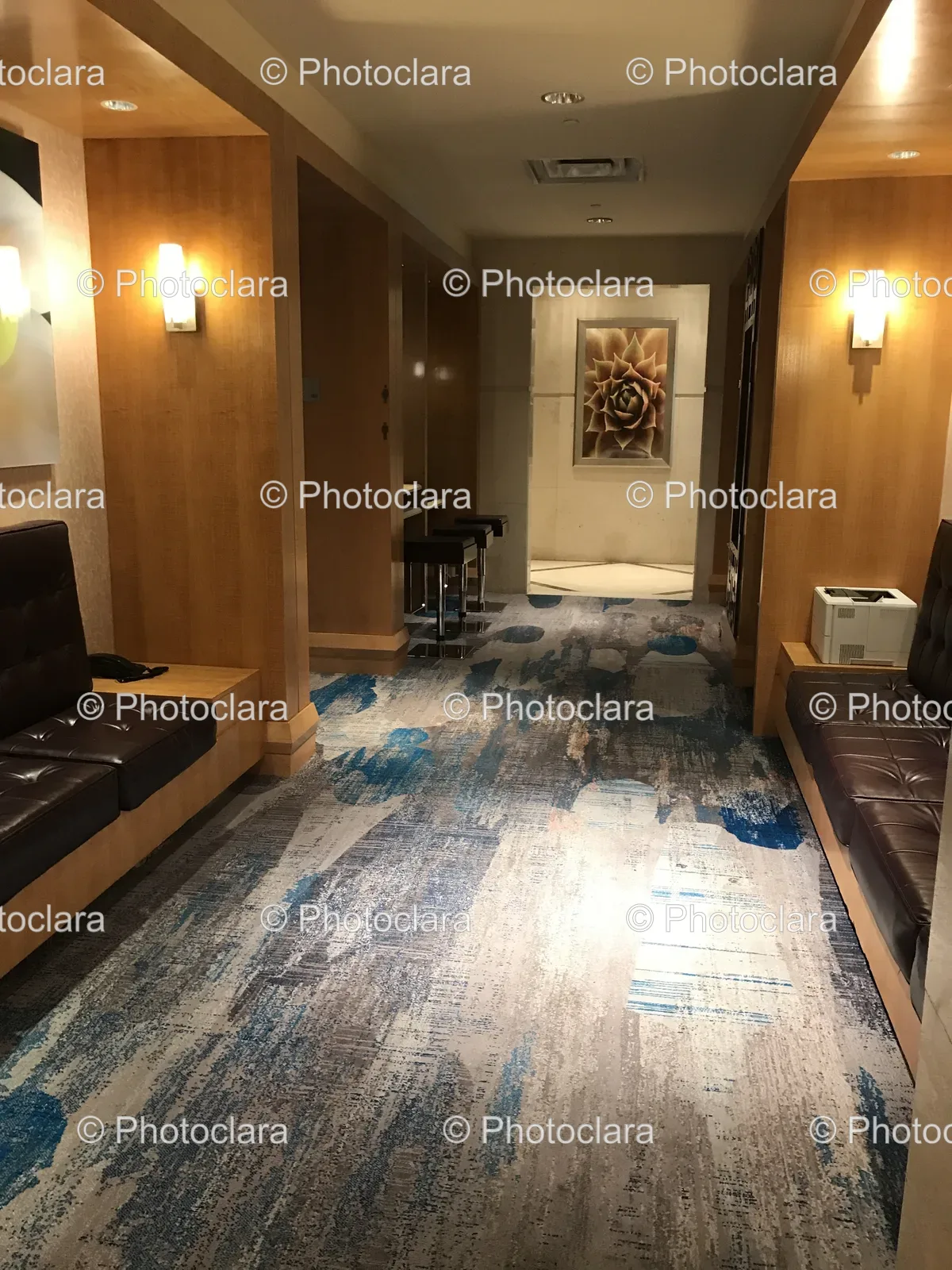 Elegant-Hallway-with-Benches-and-Wall-Painting.jpg
