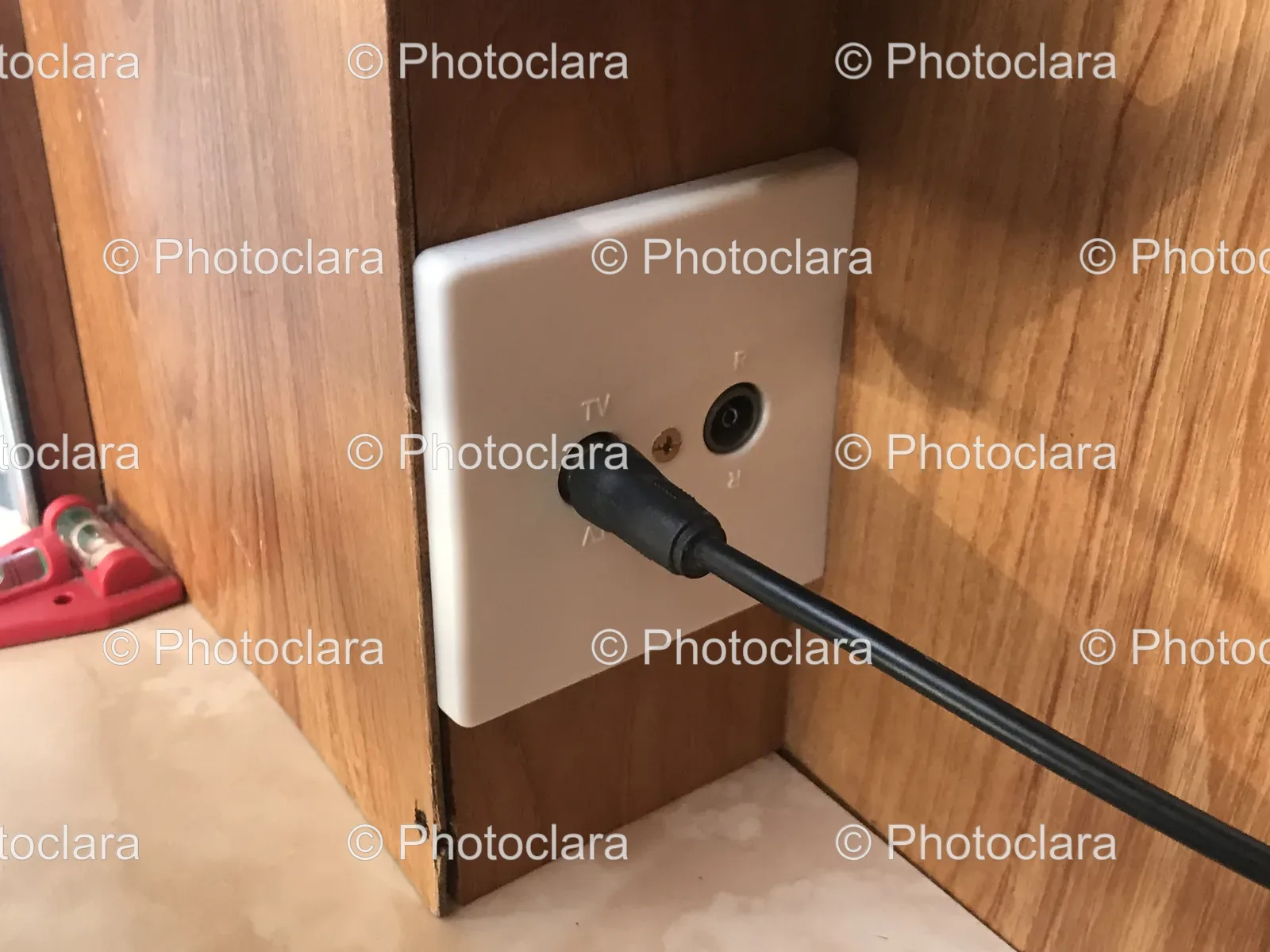 plug-in-wall-outlet-with-tv-cable.jpg