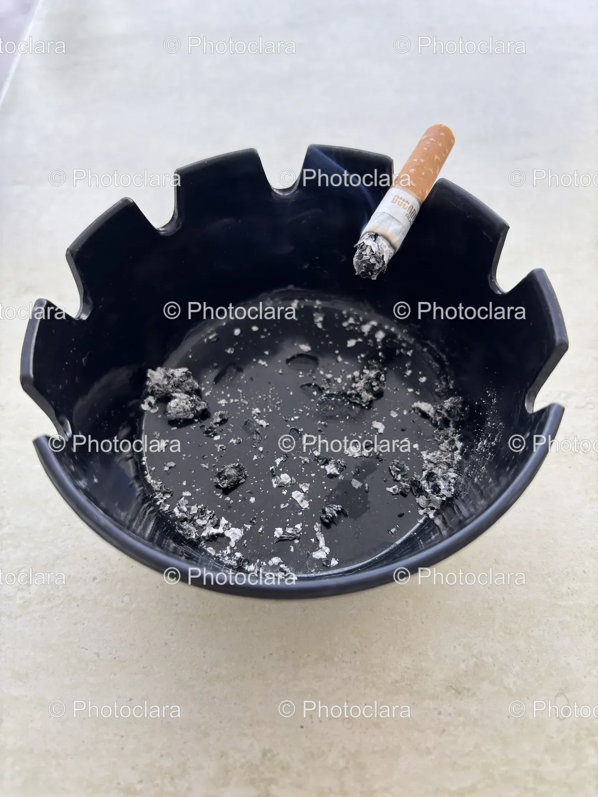 Cigarette-in-Ashtray-Close-Up.jpg