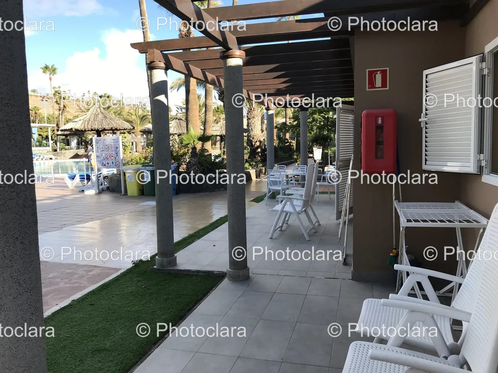 Charming-Patio-With-Red-Telephone.jpg