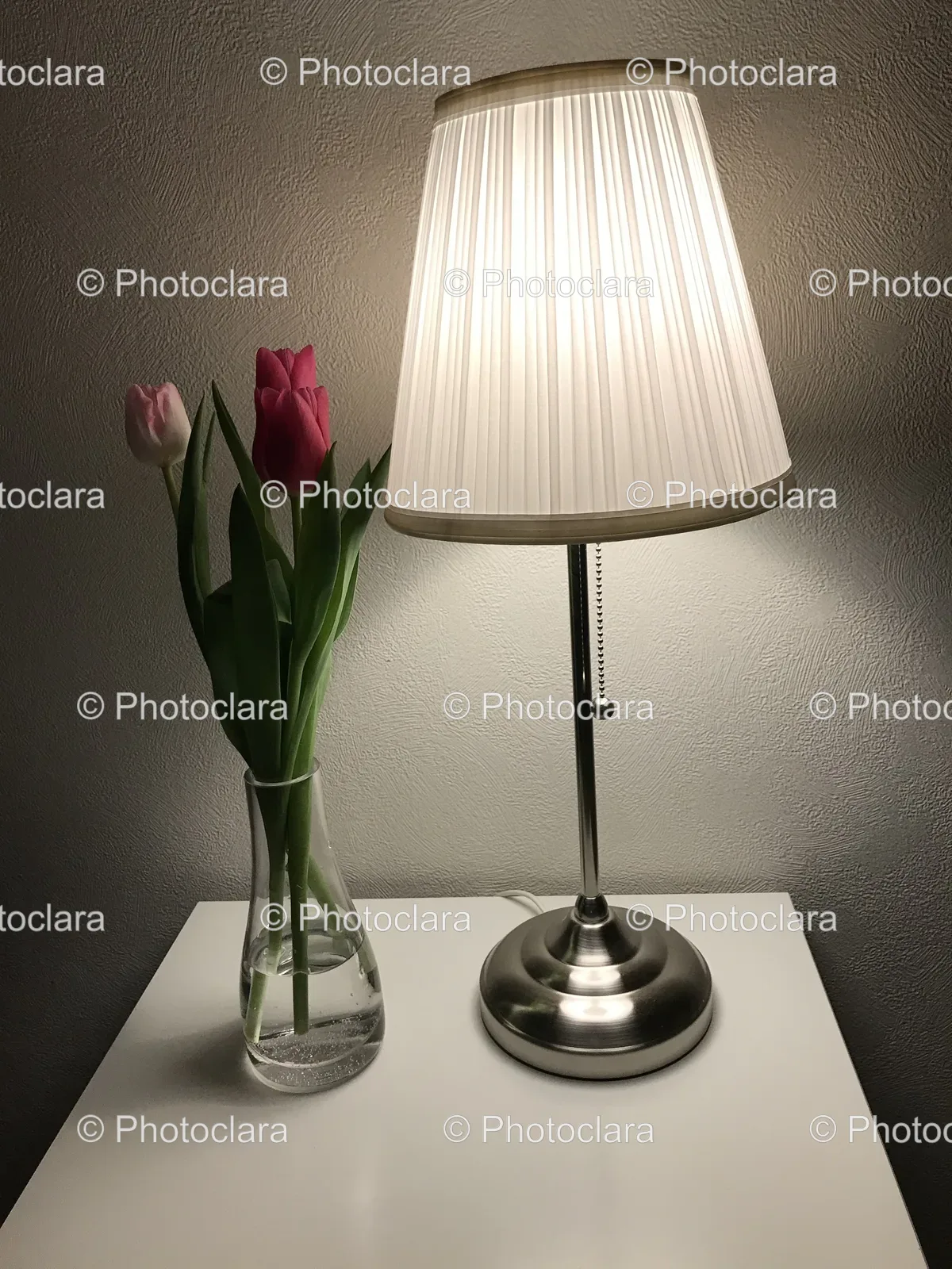 Elegant-Lamp-and-Floral-Arrangement-on-Table.jpg
