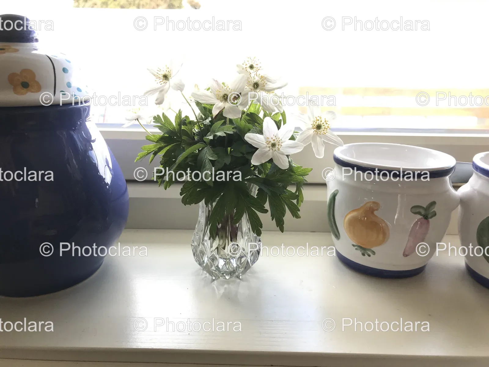 Vase-With-Flowers-On-Window-Sill.jpg