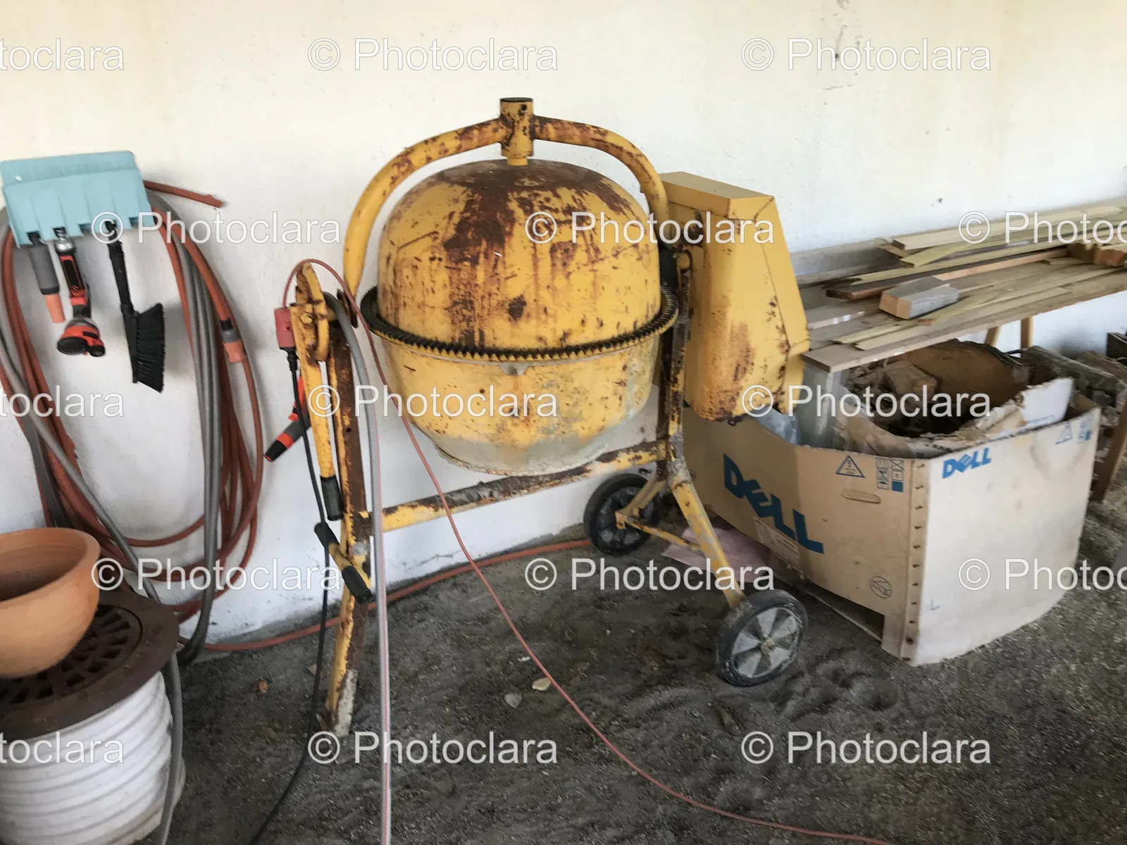 abandoned-yellow-cement-mixer-indoor-construction-site.jpg