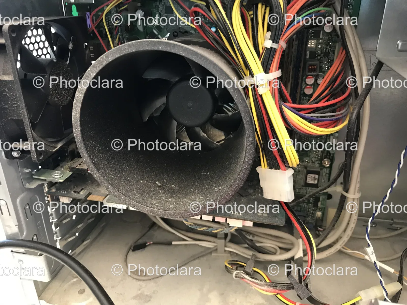 computer-case-with-wiring-and-fan.jpg