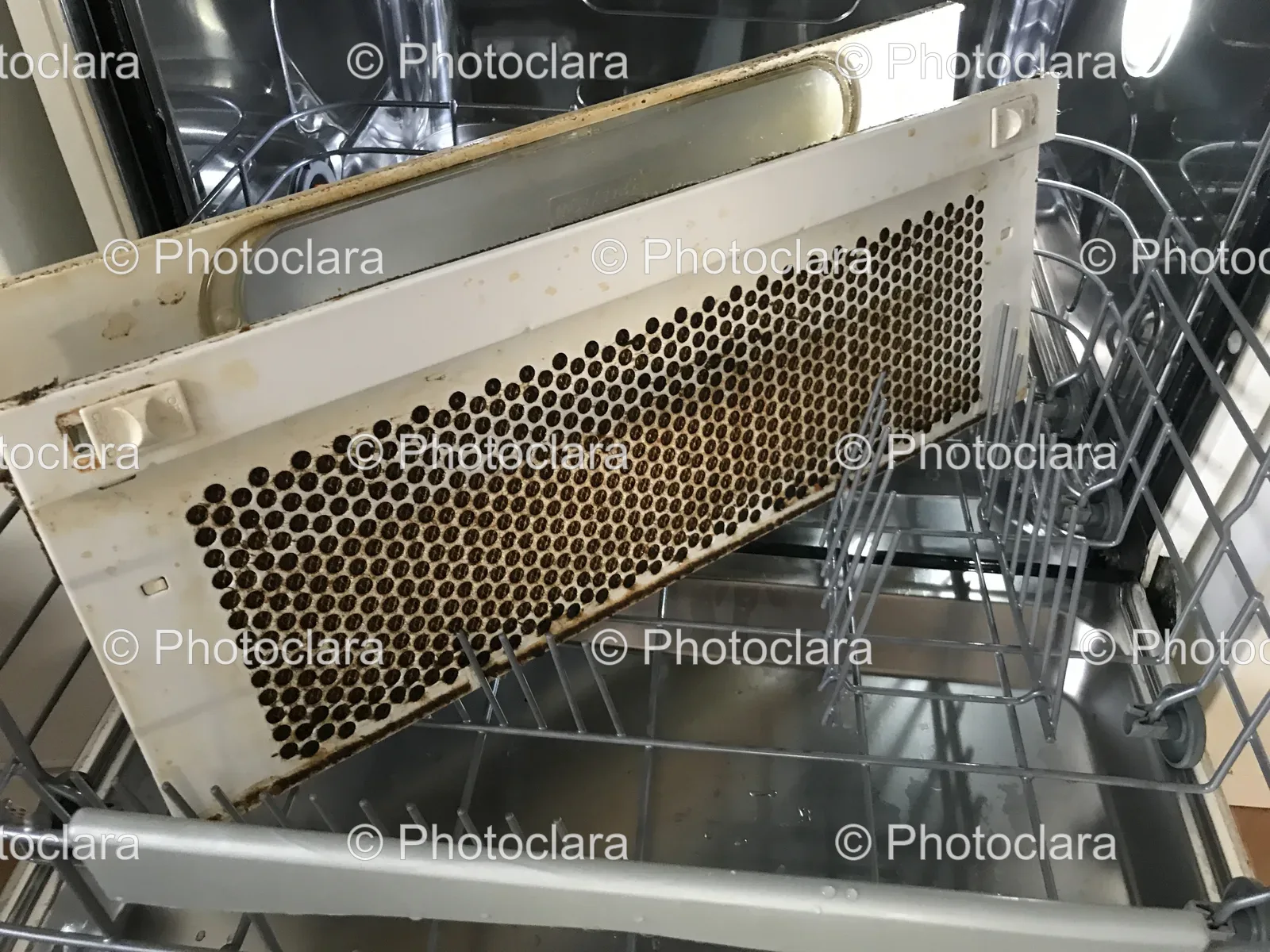 Weathered-Metal-Plate-With-Holes.jpg