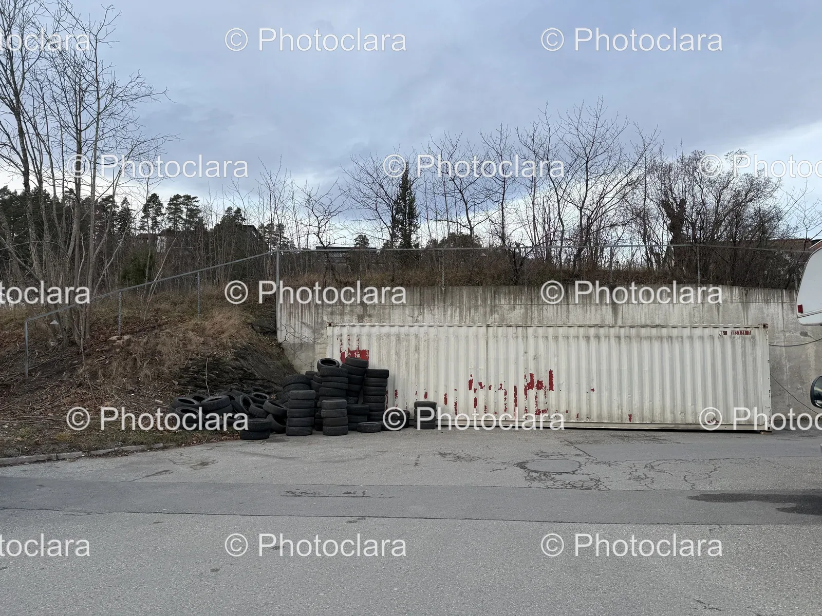 Abandoned-Tires-By-The-Wall.jpg