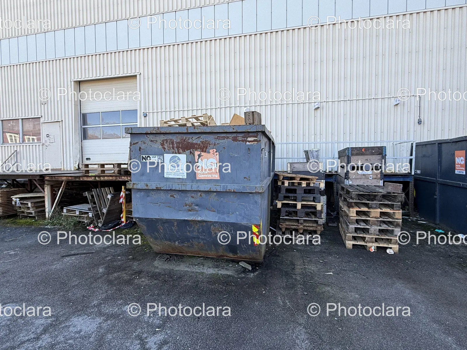 Dumpster-Next-to-Pallets.jpg