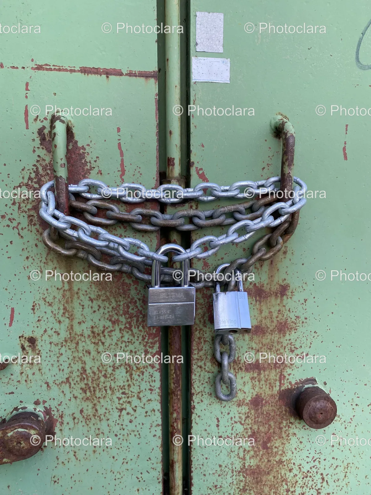 locked-door-with-chain-and-padlock.jpg