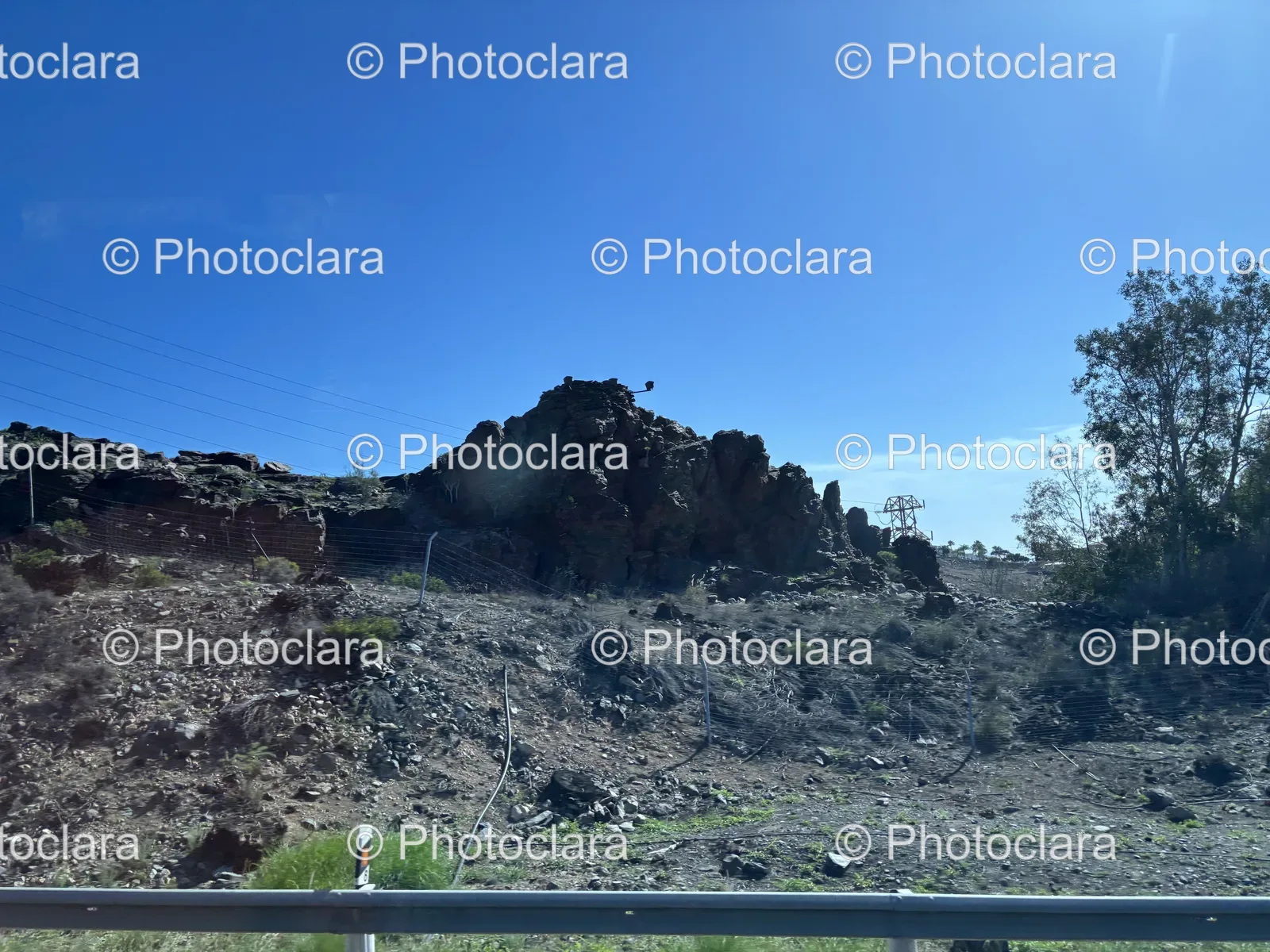 Rocky-Hill-Under-a-Blue-Sky.jpg