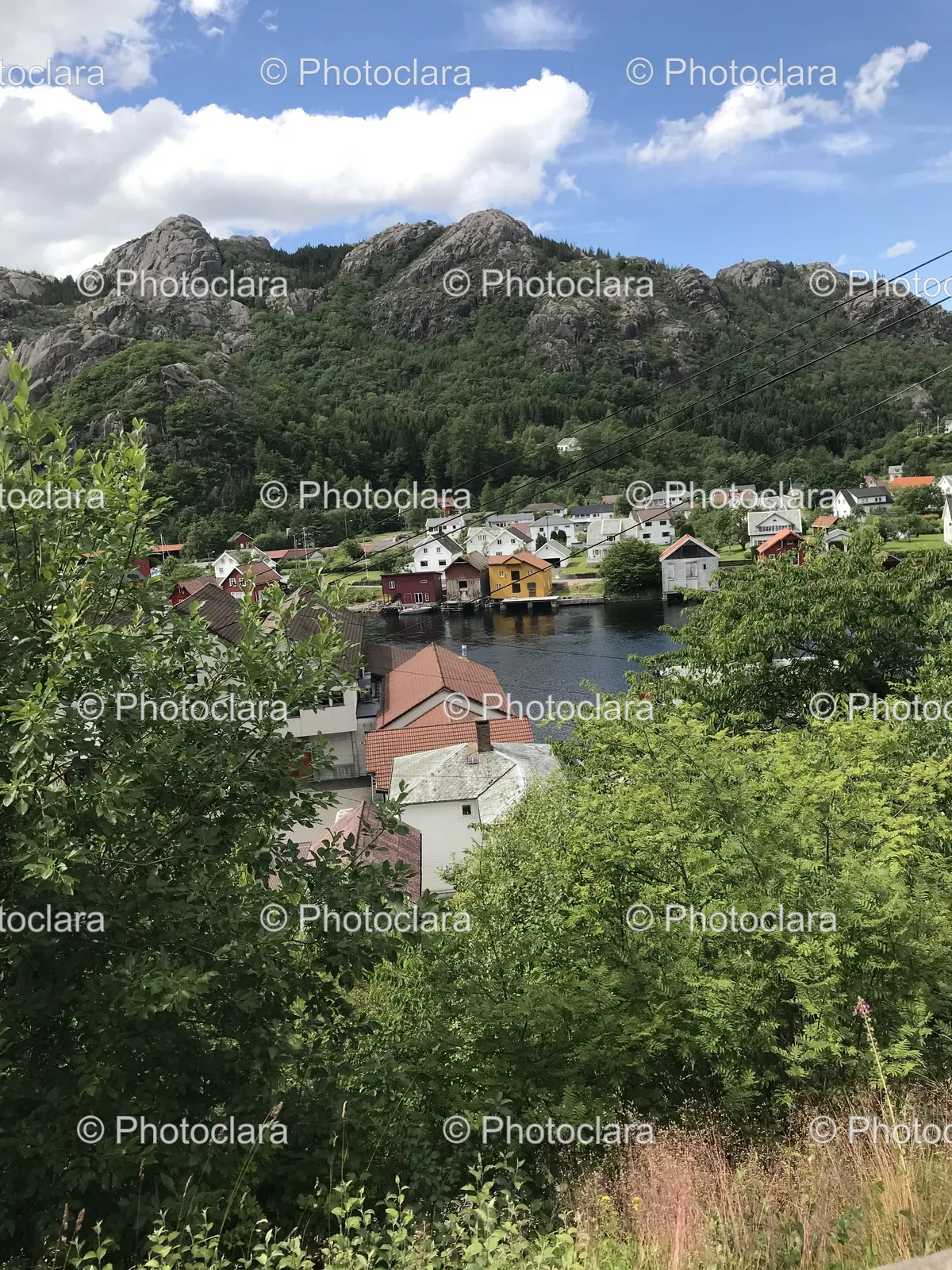 Mountain-Town-with-Lake-and-Cloudy-Sky.jpg