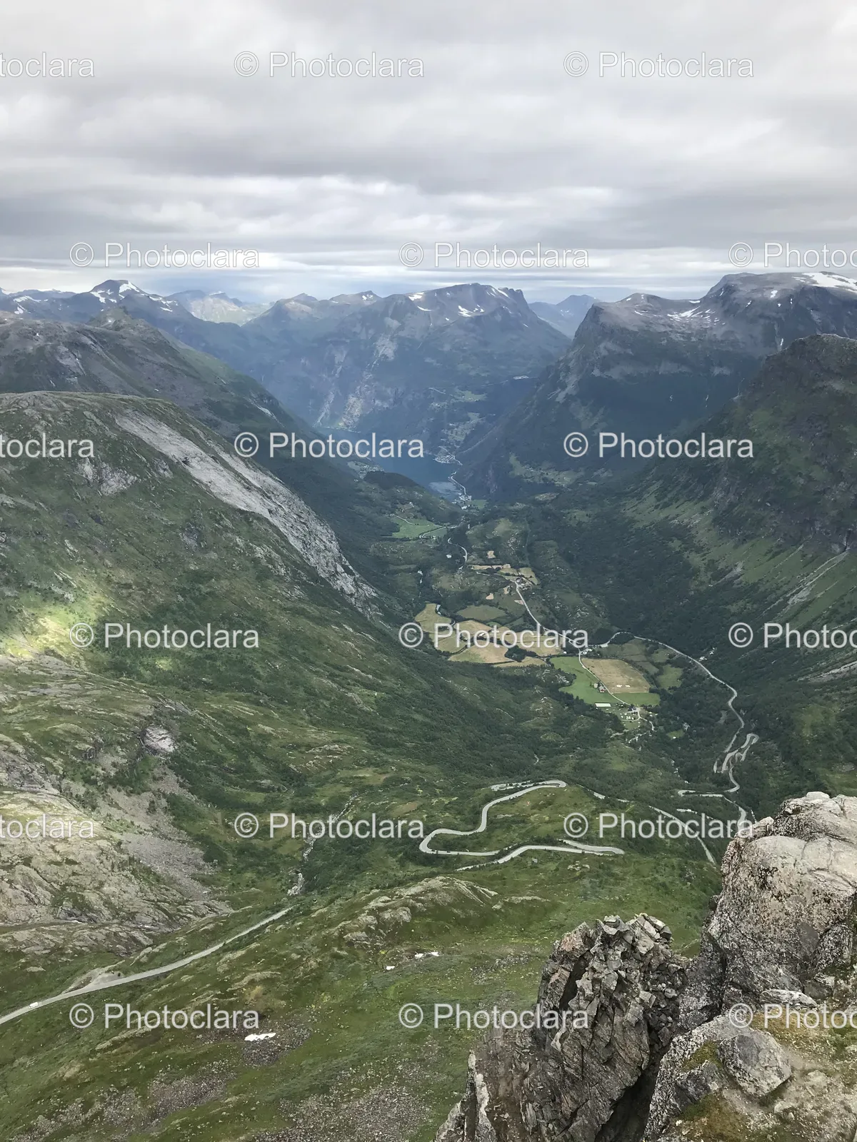 Scenic-Valley-with-Road-and-Mountain-Range.jpg