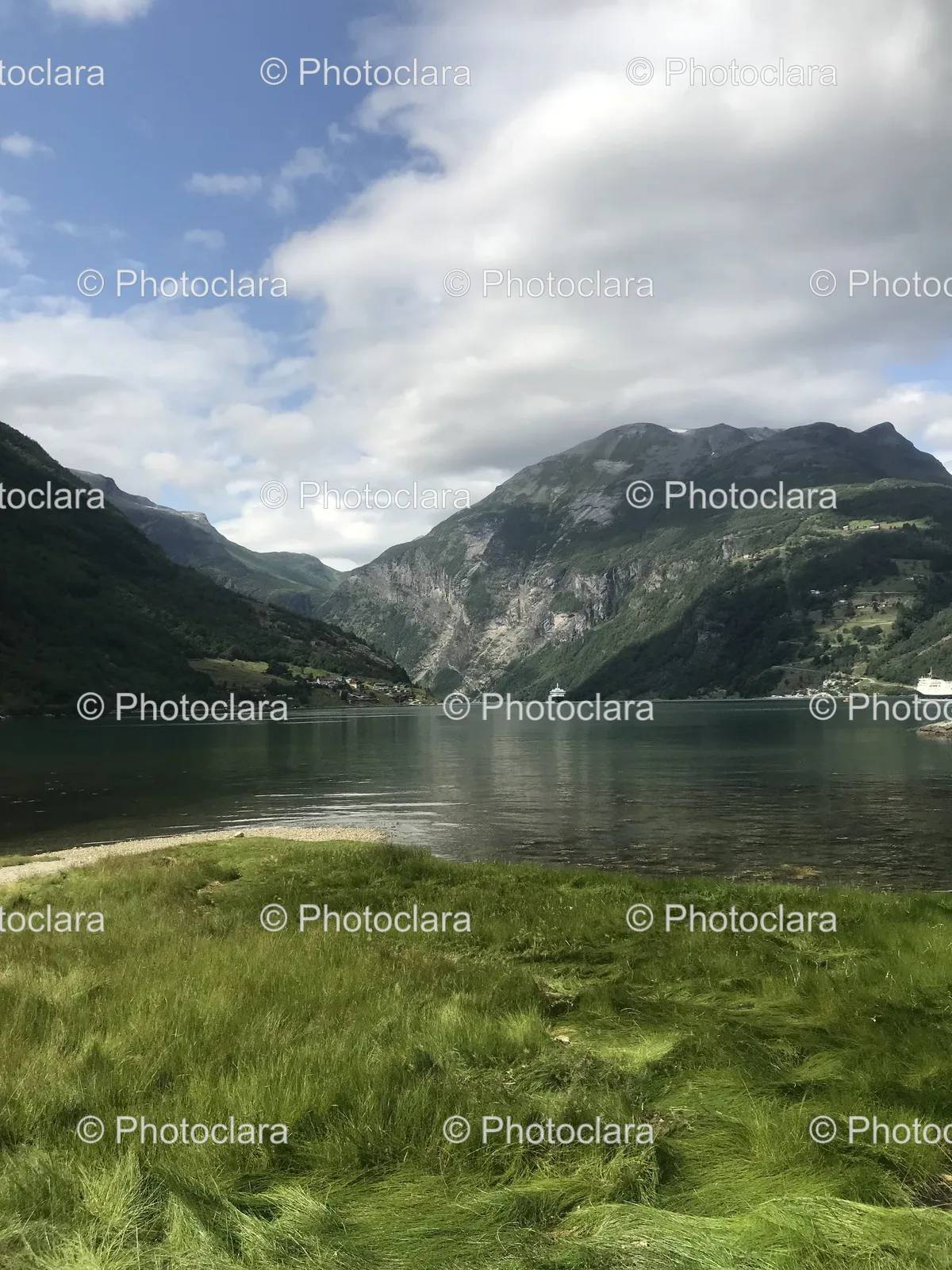 serene-lake-with-majestic-mountains-in-the-background.jpg