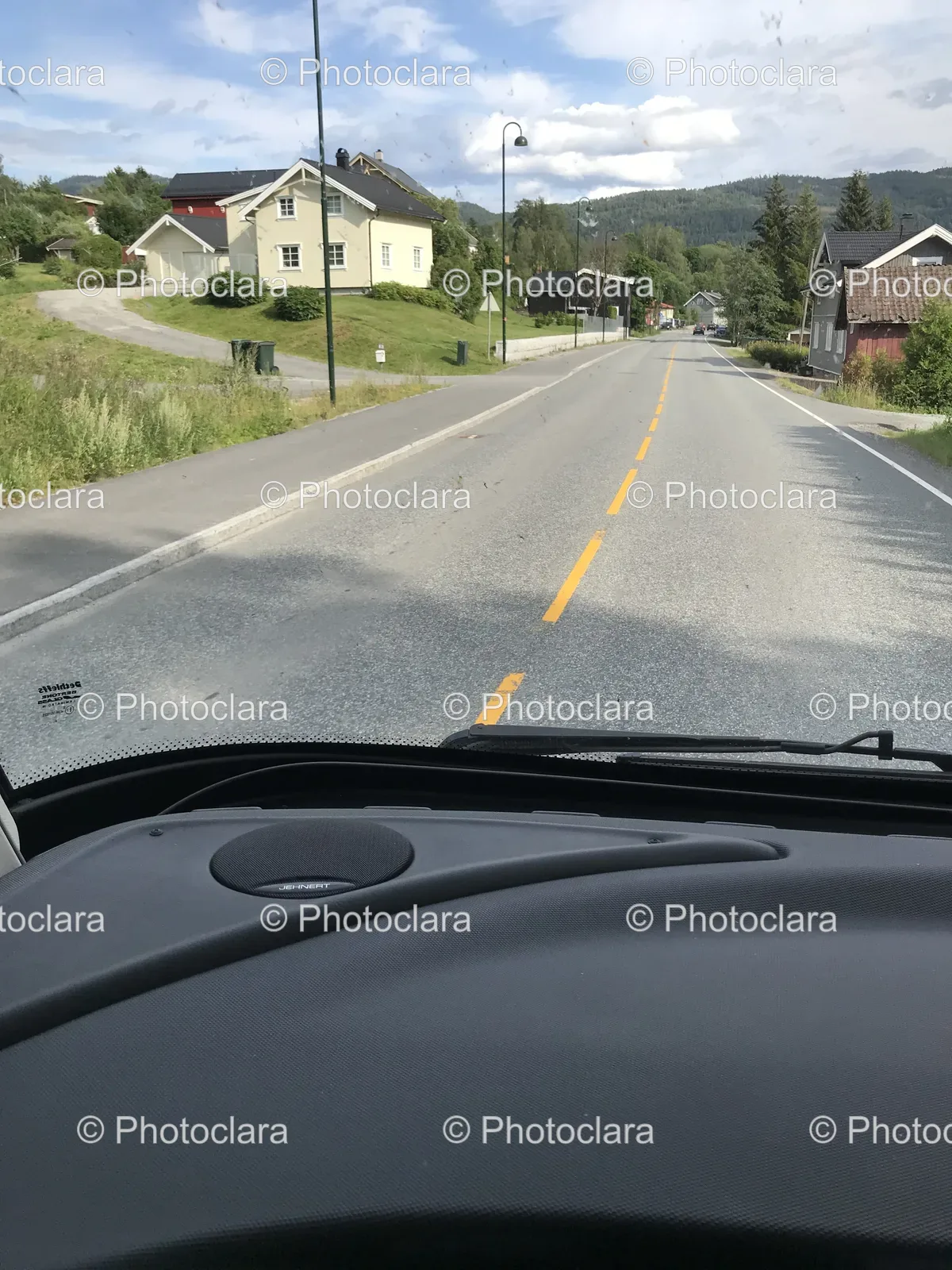 Scenic-Road-with-Houses-and-Trees.jpg