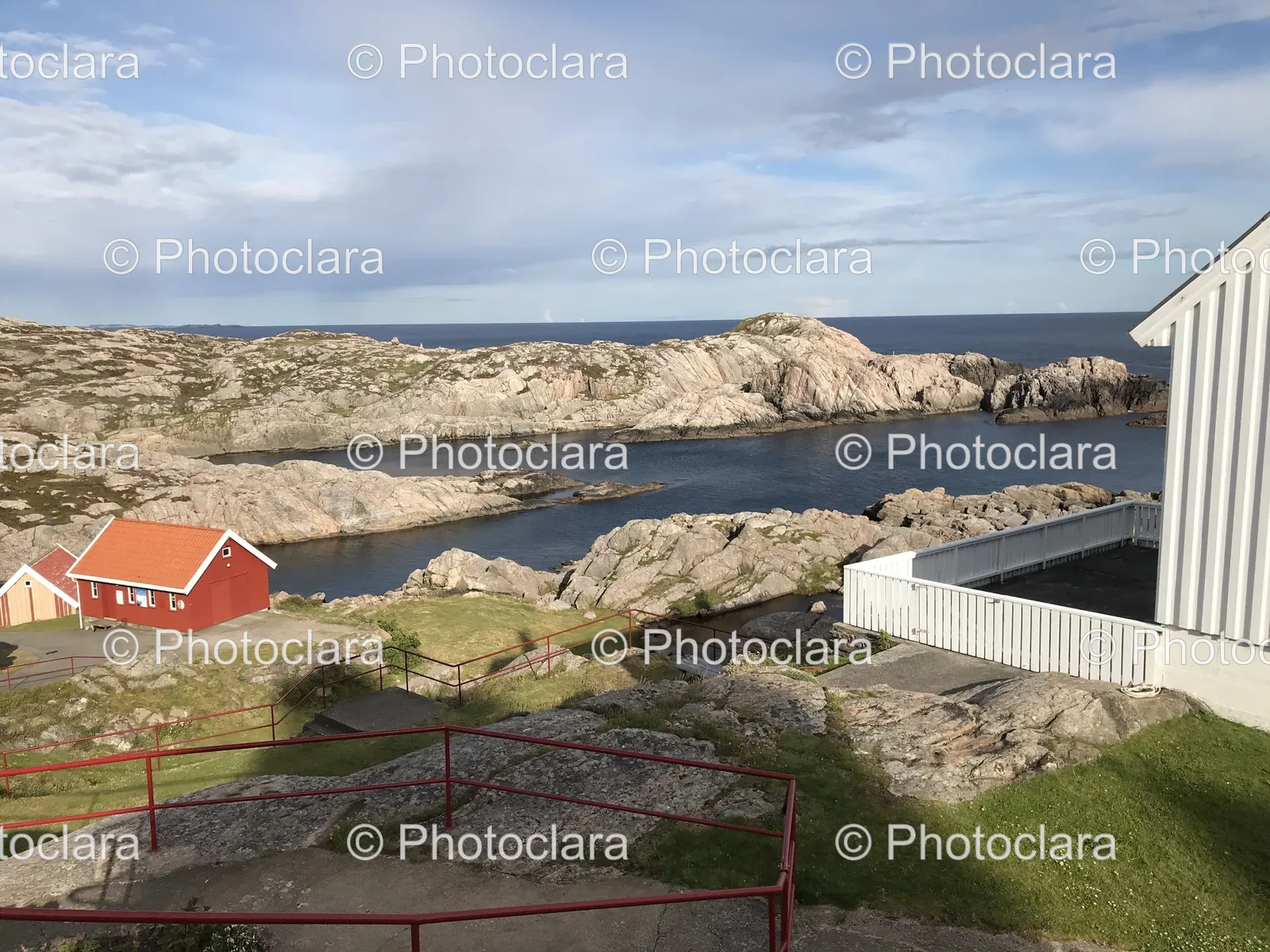rocky-coastline-with-red-building.jpg