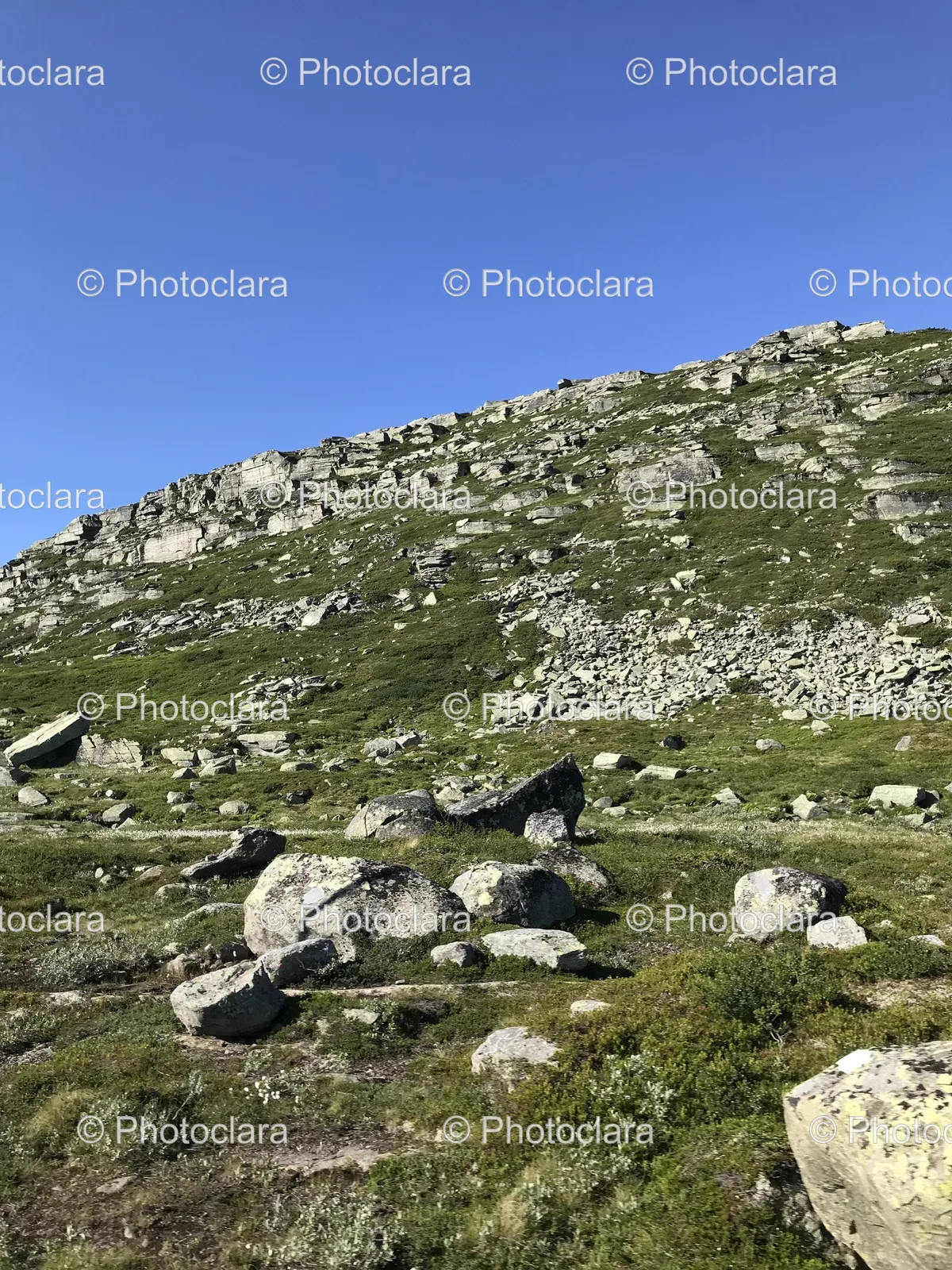 rocky-hill-under-blue-sky.jpg