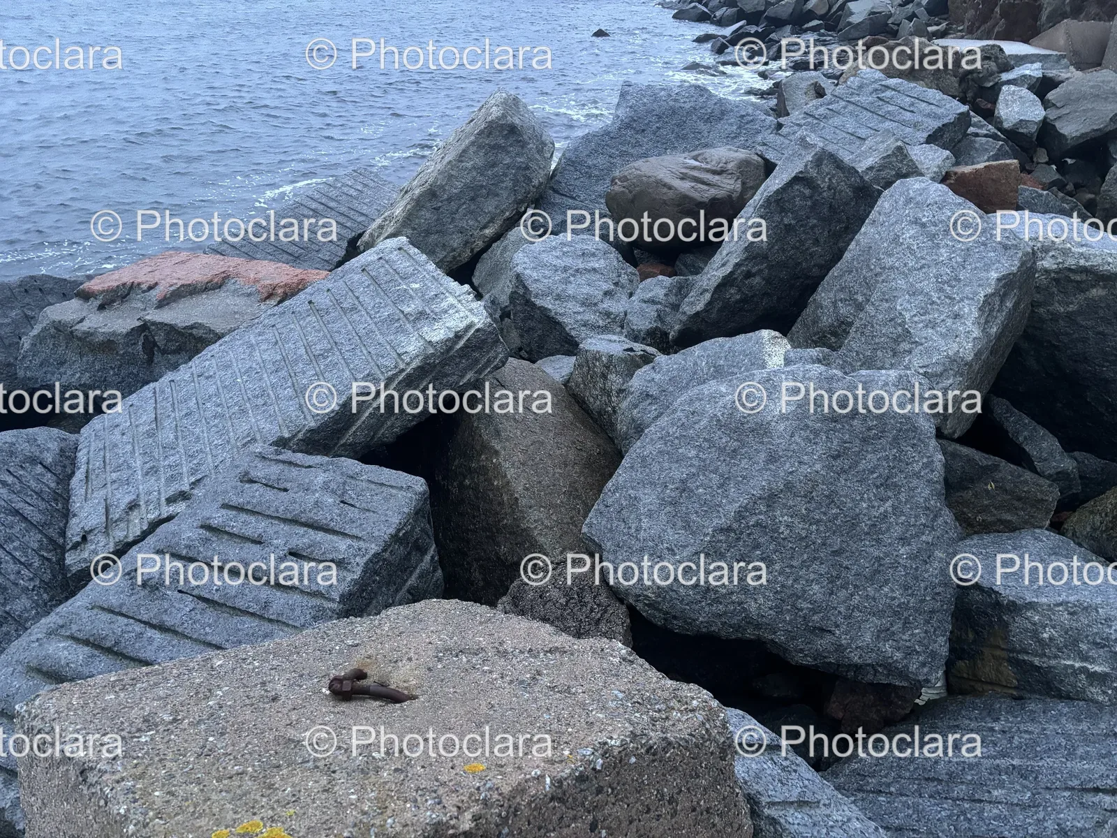 Pile-of-Rocks-by-the-Water.jpg
