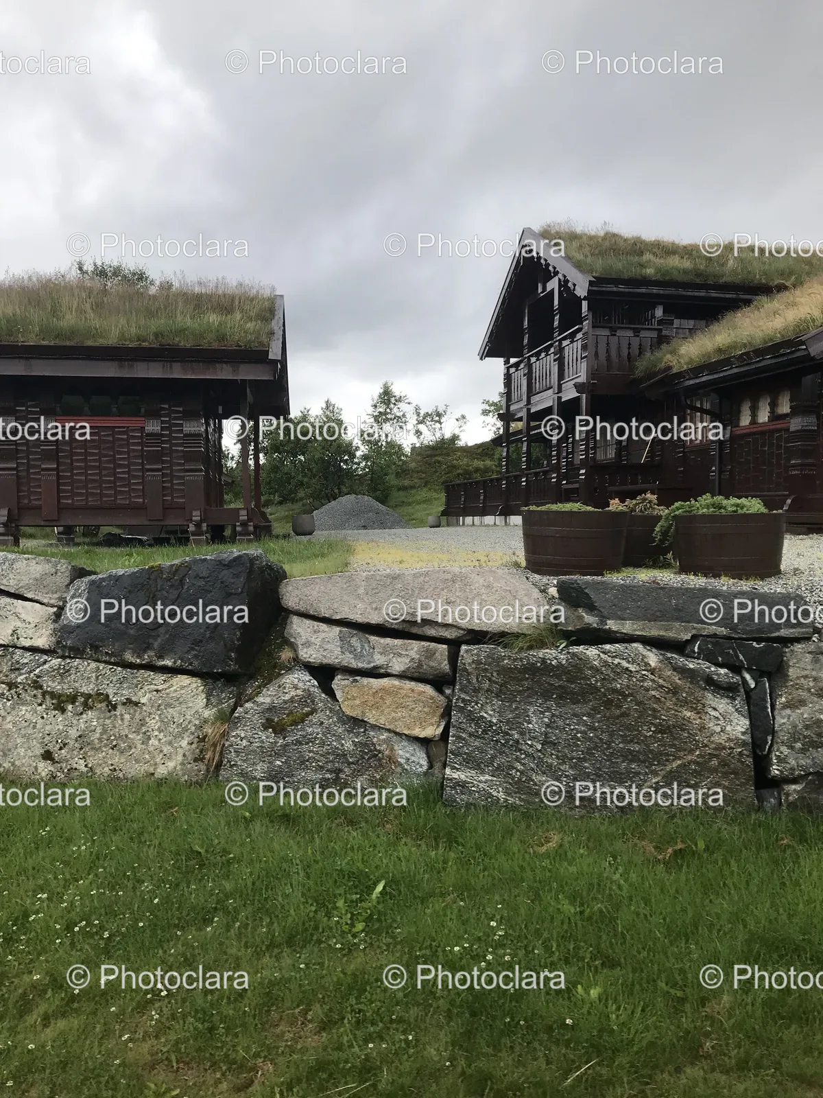stone-house-grass-roof-rural-setting.jpg