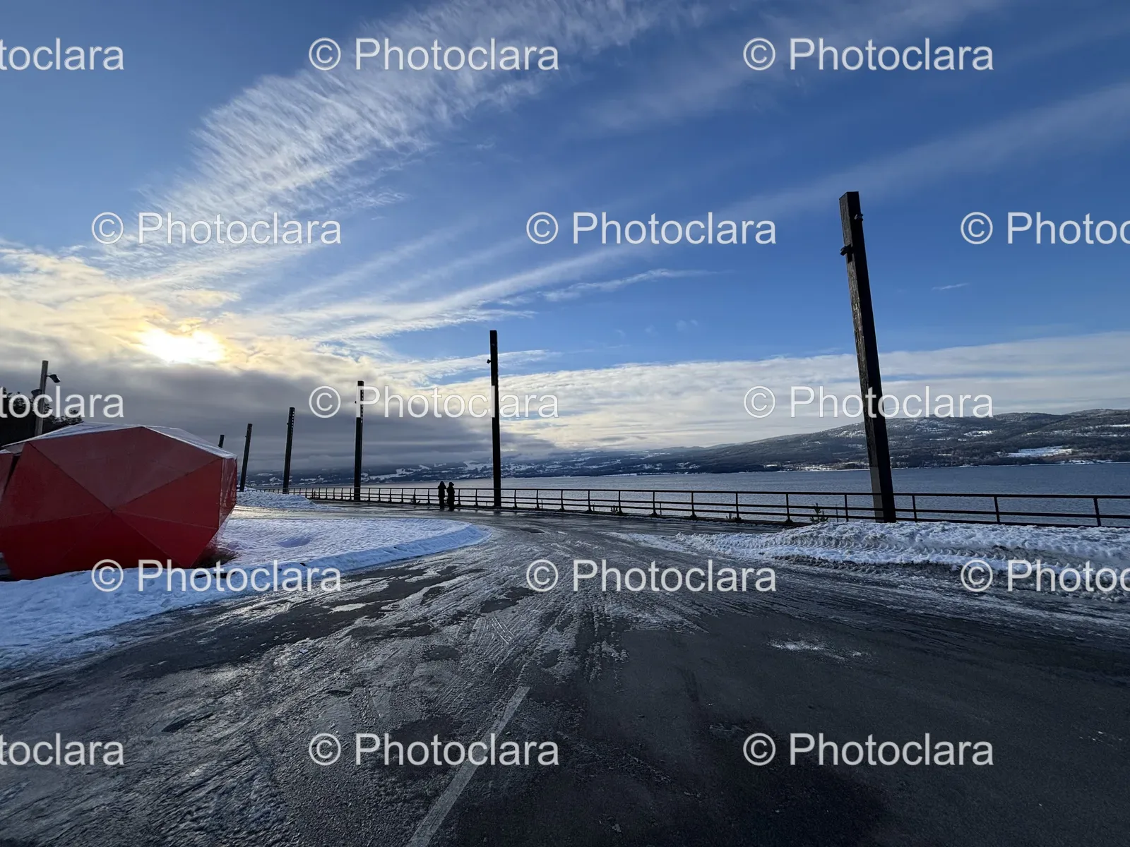 Serene-Winter-Road-With-Waterscape.jpg