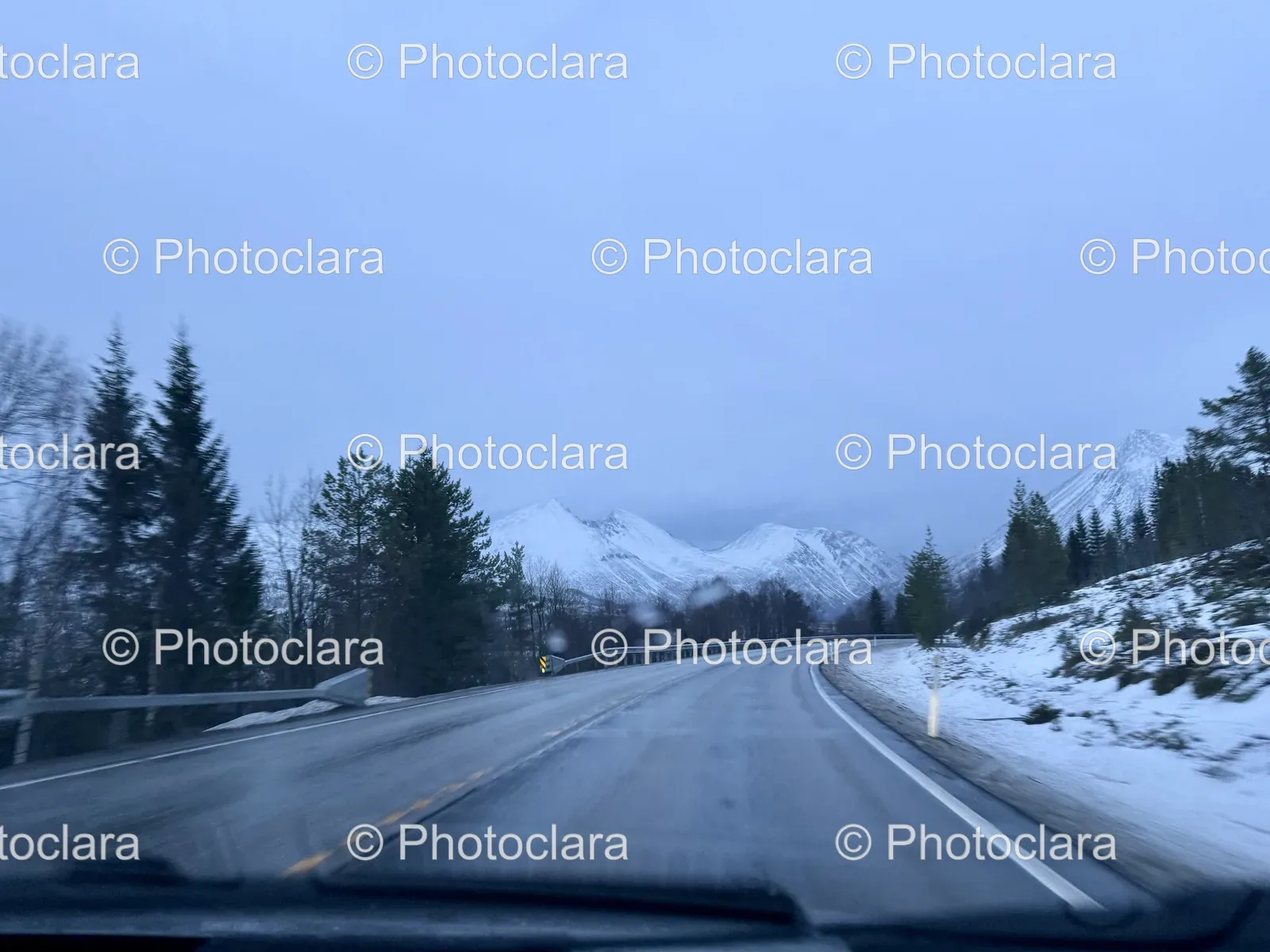 Winter-Road-With-Snowy-Mountains.jpg