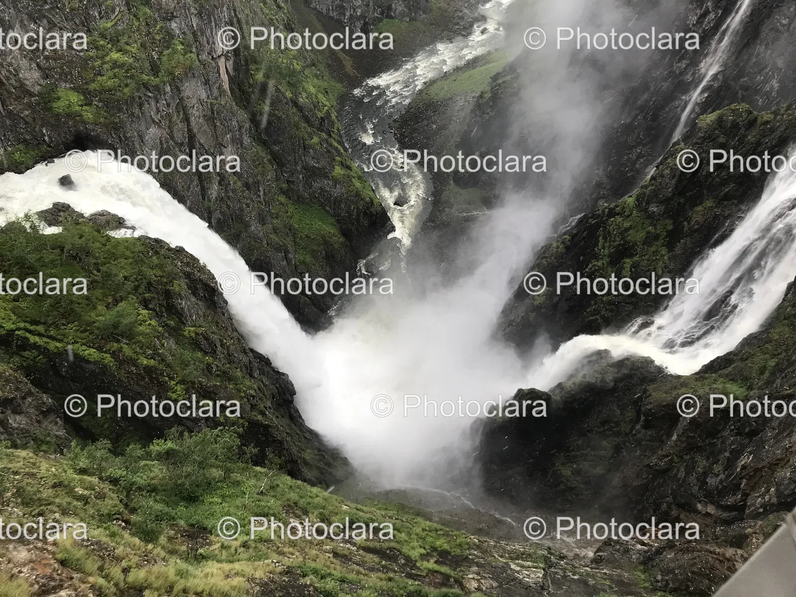 majestic-waterfall-over-rocky-terrain.jpg