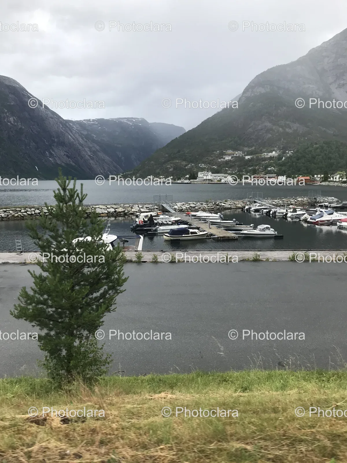 Boats-on-Serene-Lake-with-Mountain-Backdrop.jpg