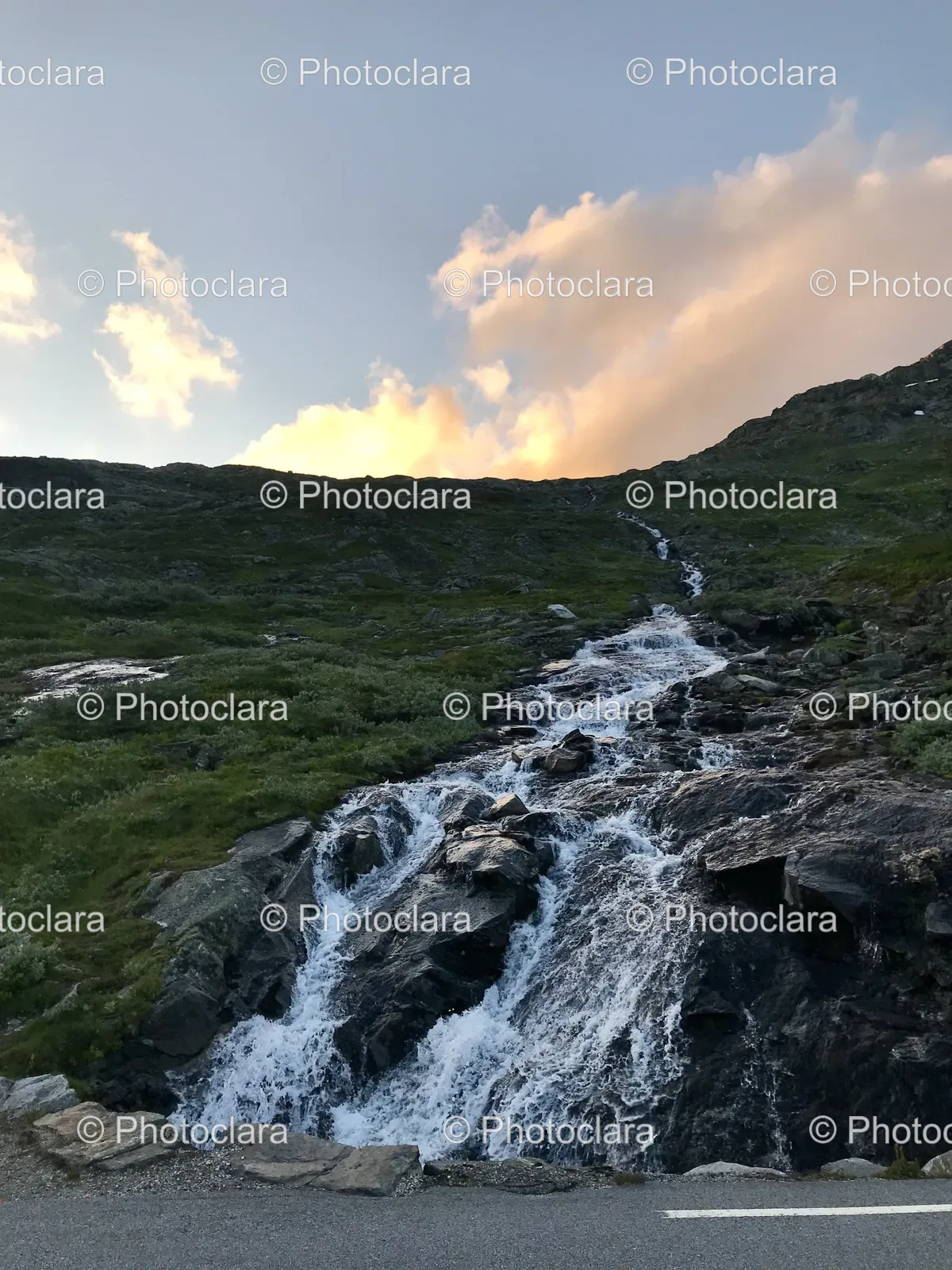 Breathtaking-Waterfall-on-Rocky-Hill.jpg