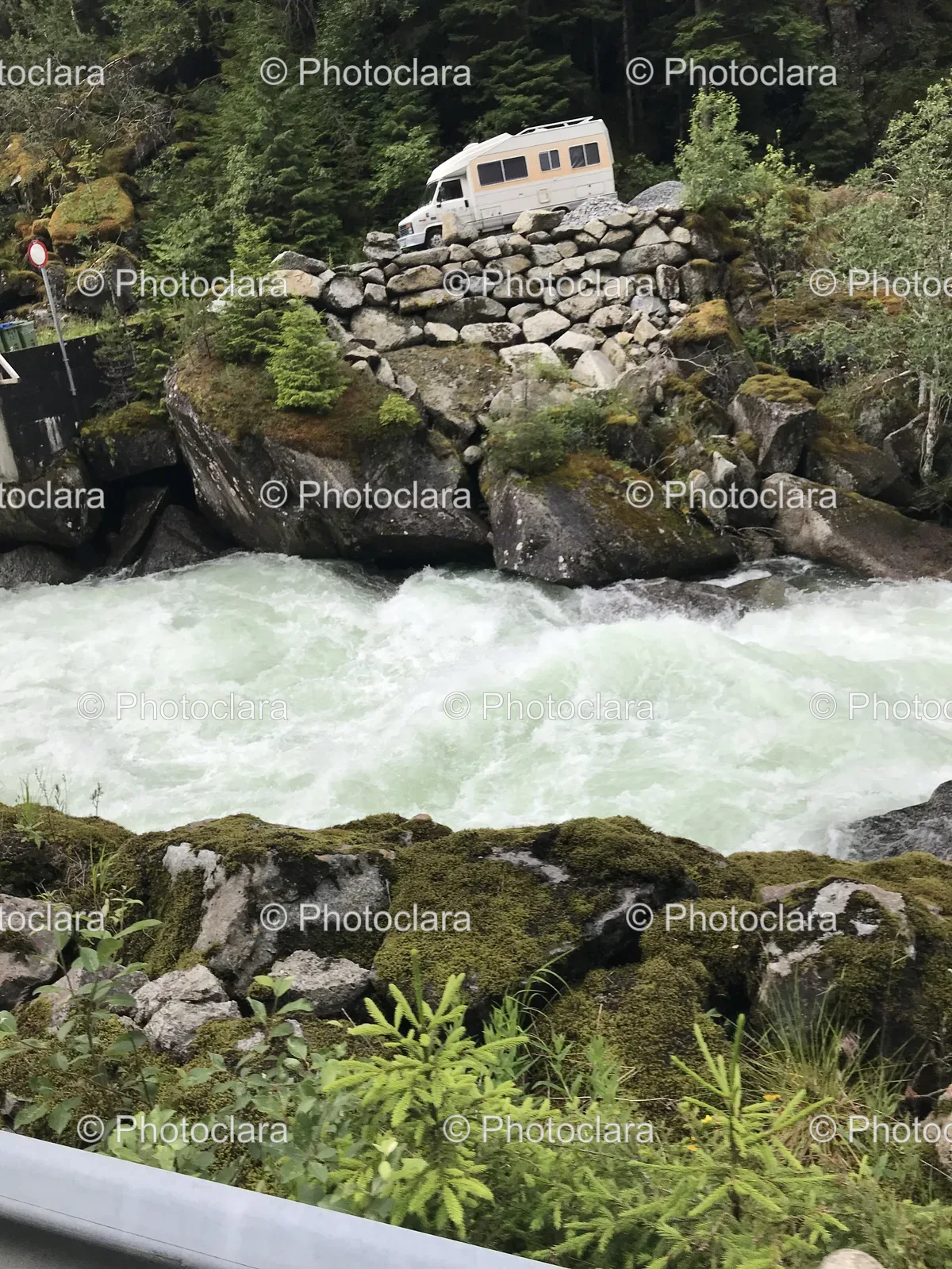 Charming-White-House-Above-River.jpg