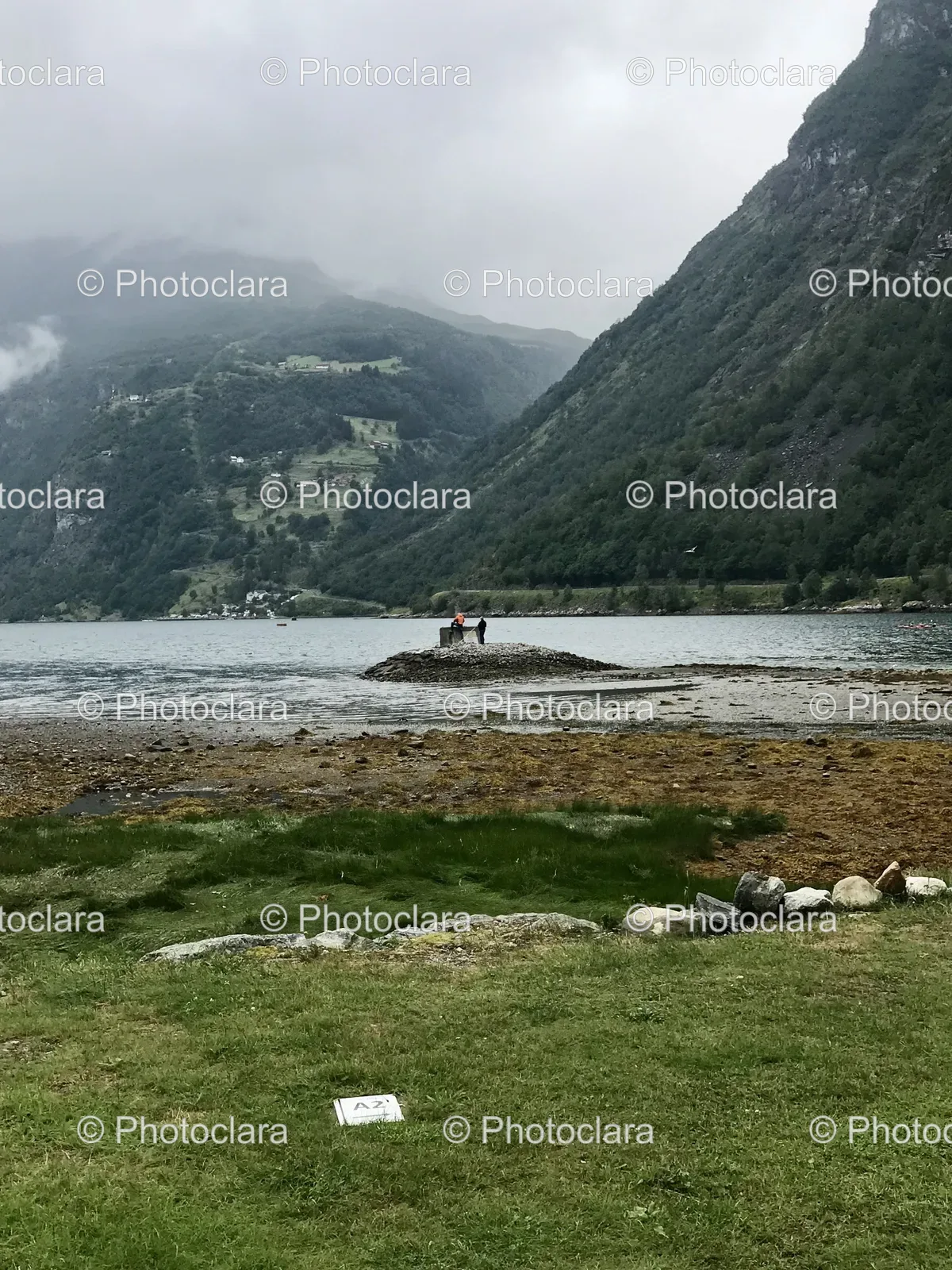 Group-of-People-on-Rock-in-a-Lake.jpg