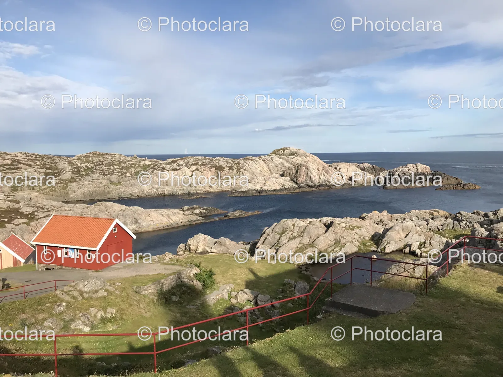 Red-House-on-a-Rocky-Shore.jpg