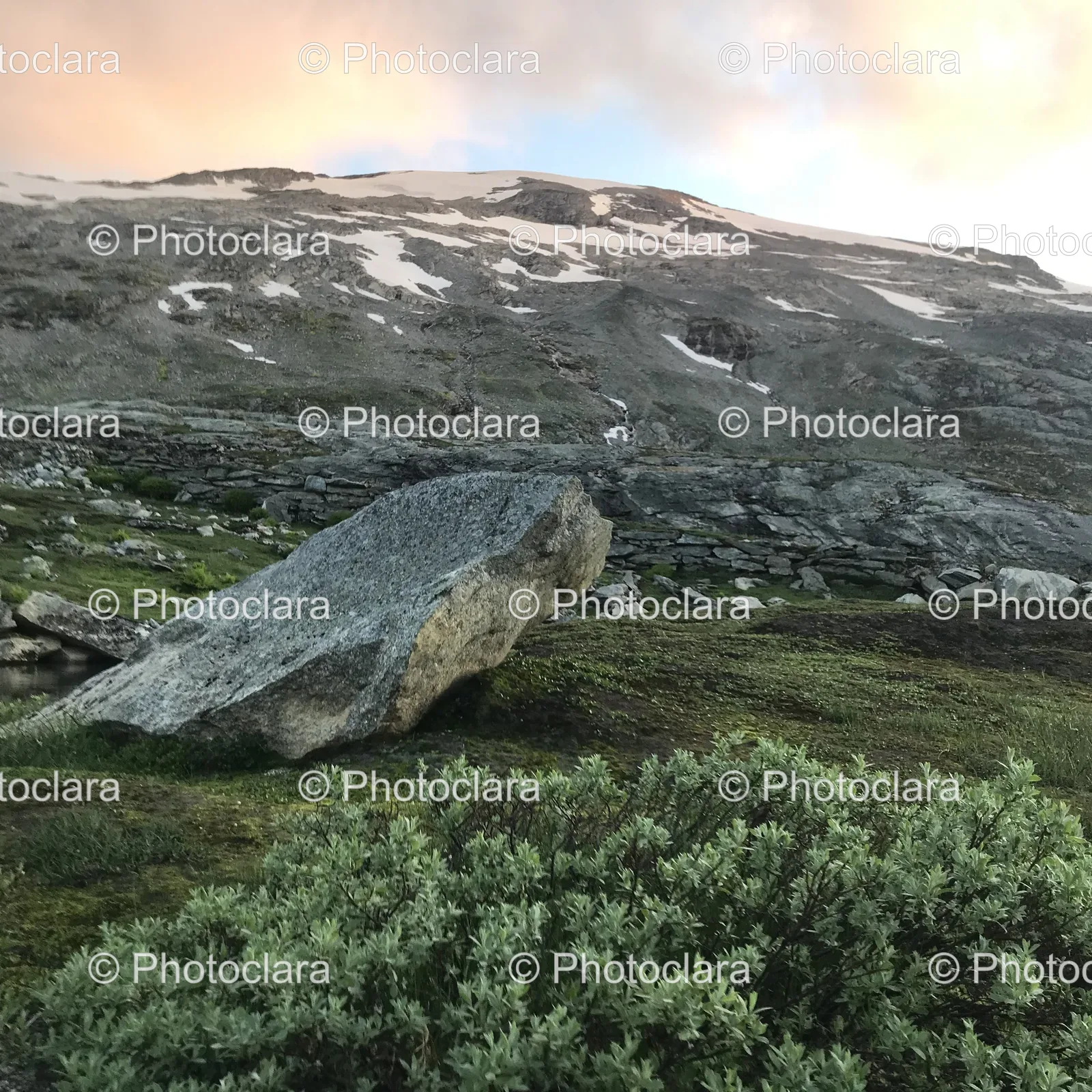 solitary-rock-on-grassy-plain.jpg