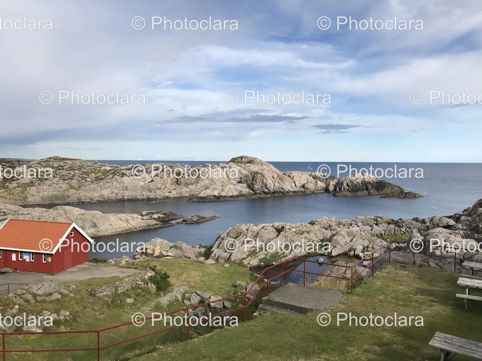 Red-Building-Next-to-Tranquil-Lake.jpg