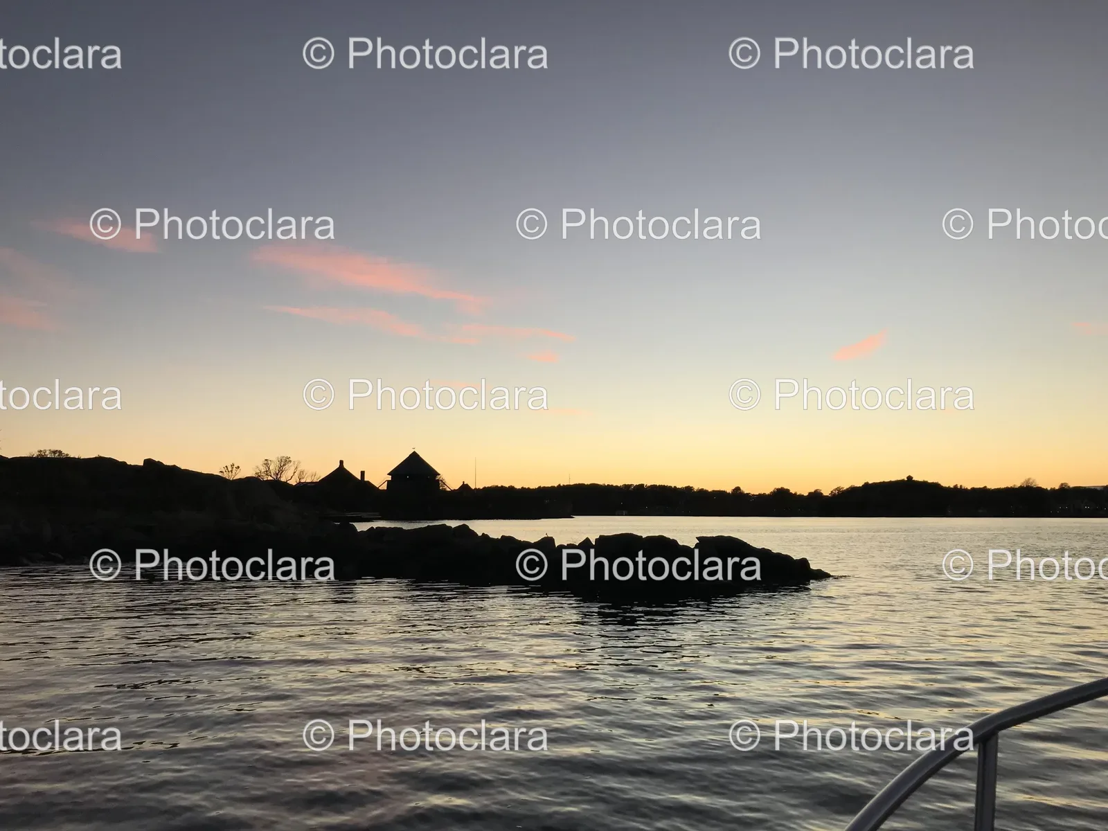 Serene-Waterscape-with-Distant-Buildings.jpg
