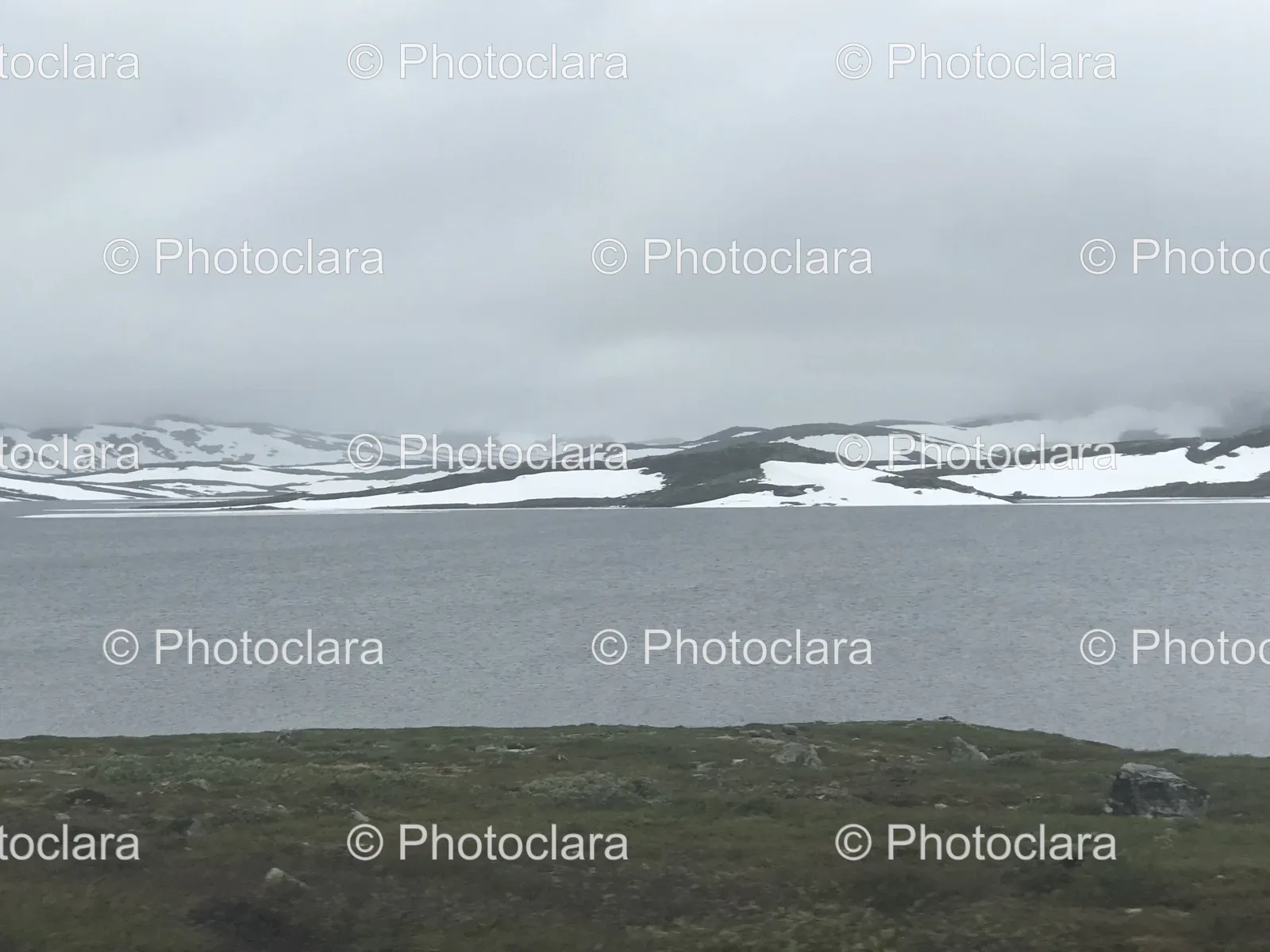 majestic-snow-capped-mountains-by-pristine-lake.jpg