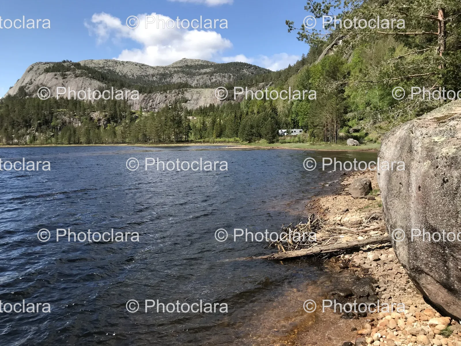 serene-lake-with-mountainous-backdrop.jpg