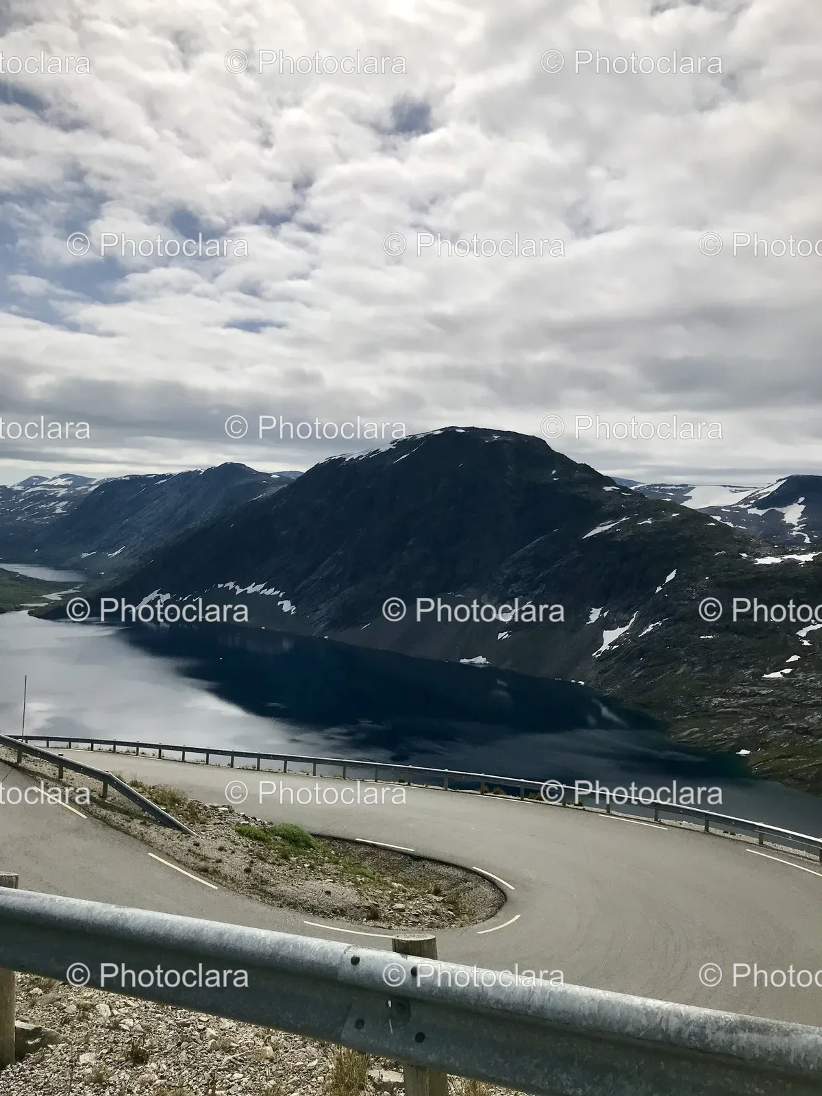 Serene-Mountain-and-Lake-Landscape-with-Road.jpg