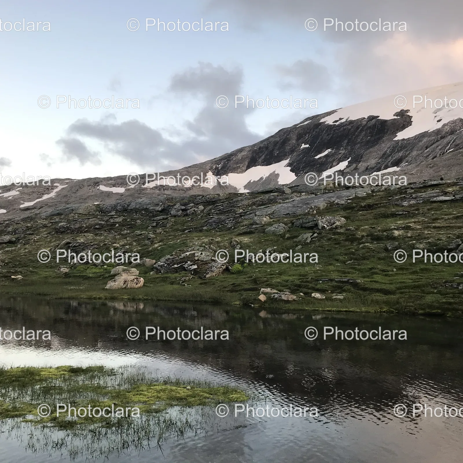 Serene-Snow-Capped-Mountain-Lake.jpg
