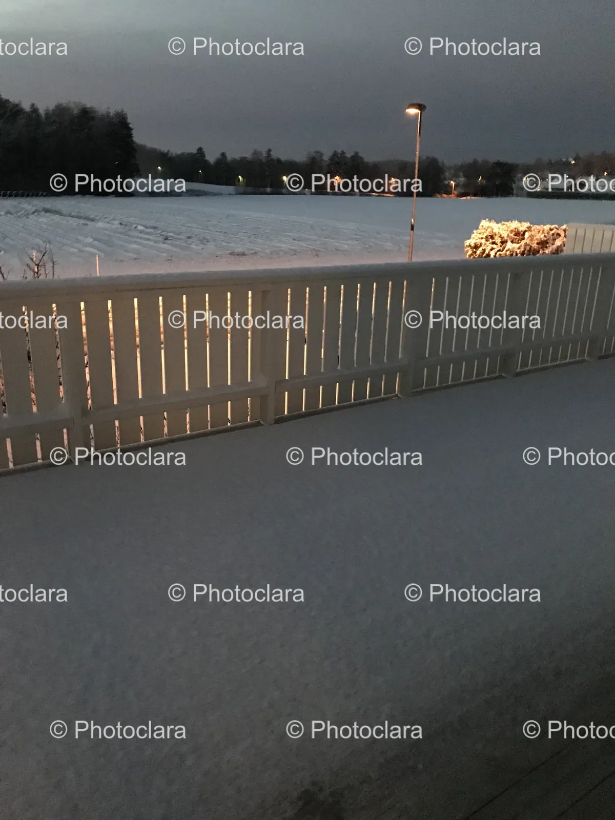 White-Fence-Illuminated-at-Night.jpg