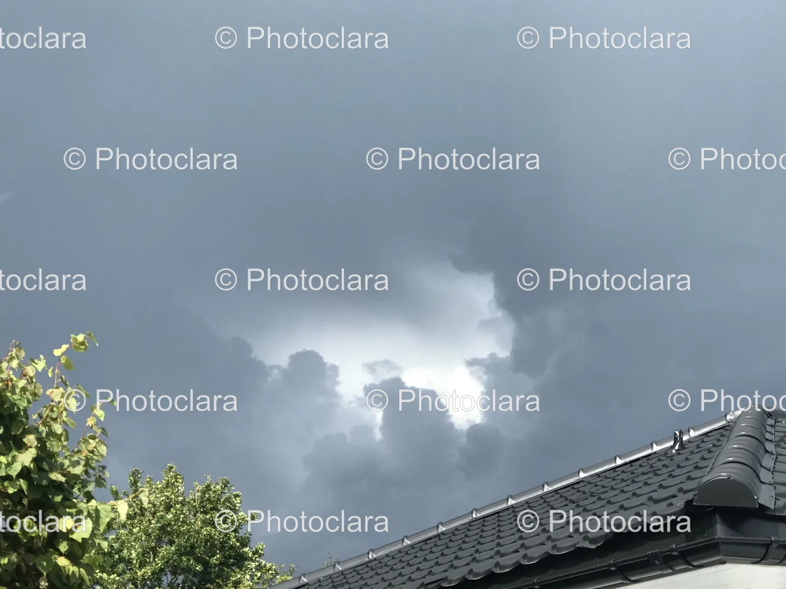 house-roof-under-cloudy-sky.jpg