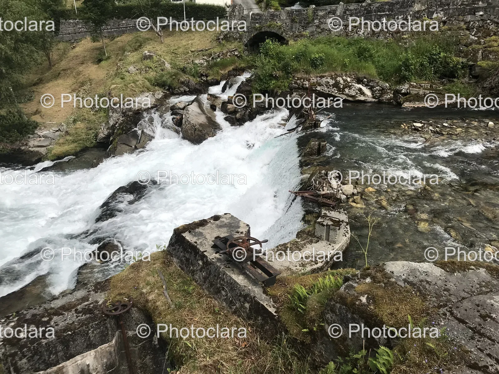 Serene-River-Flowing-Through-Rocky-Terrain.jpg