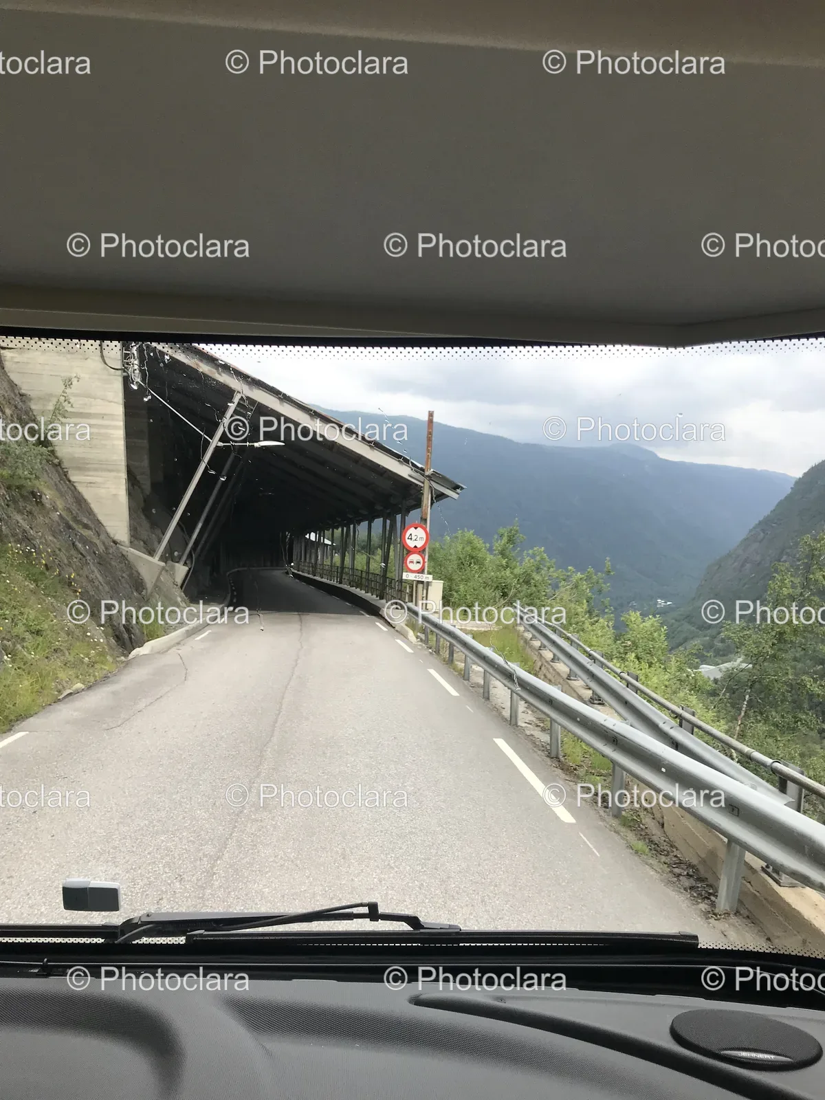 scenic-road-view-through-car-windshield.jpg