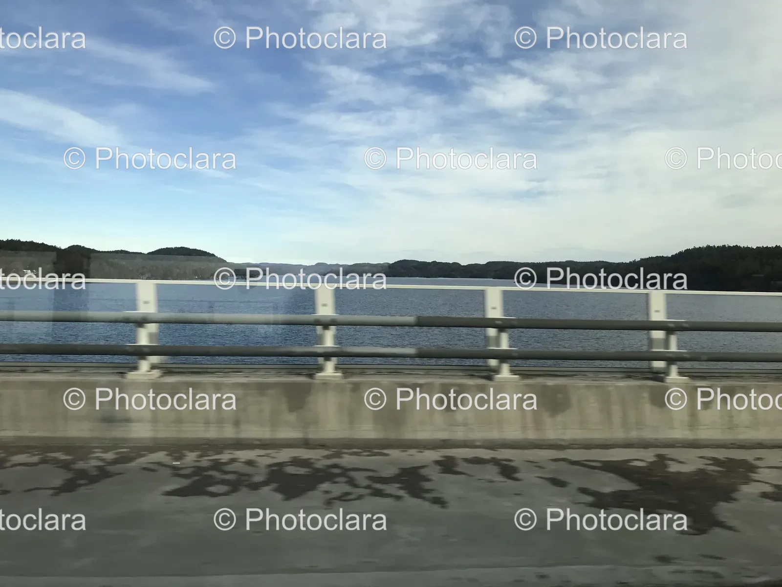 Serene-Road-Over-Water-With-Bridge.jpg