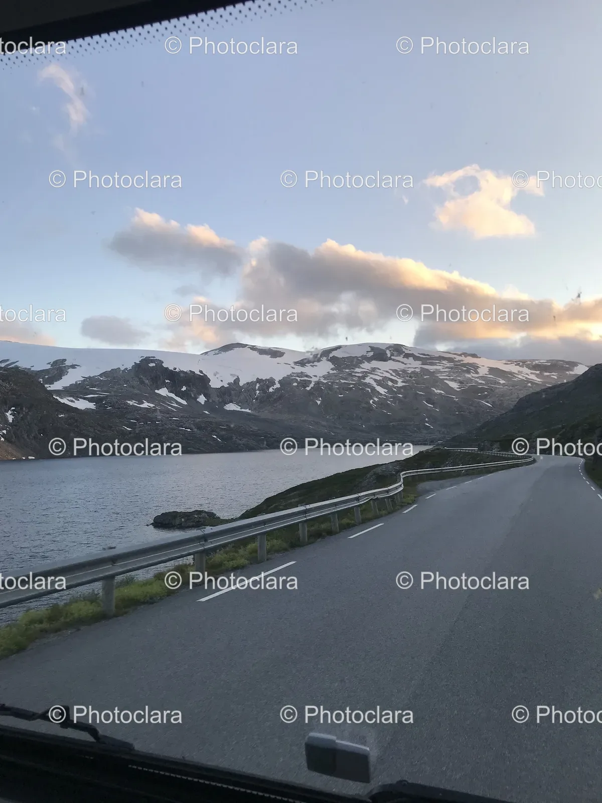 tranquil-road-stunning-mountain-lake-view.jpg