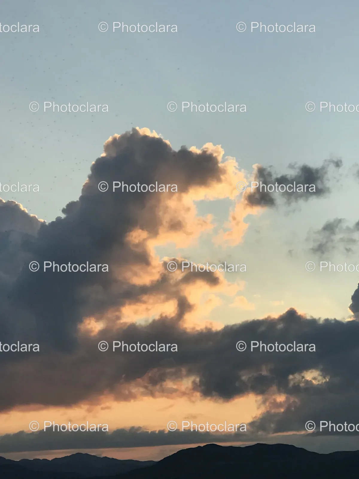 Sun-Rays-Piercing-Through-Cloudy-Sky.jpg