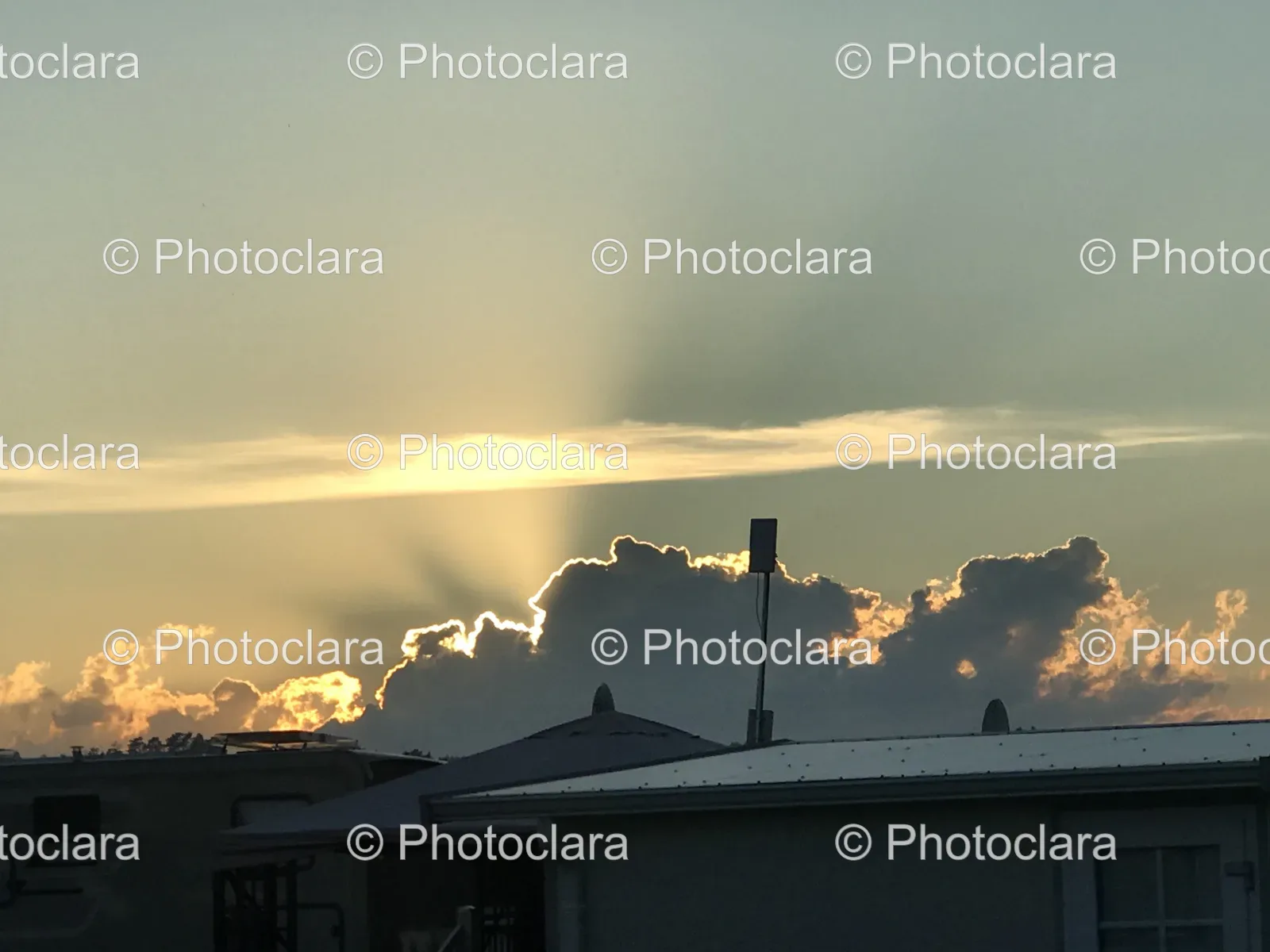 sun-shining-through-clouds-in-the-sky.jpg